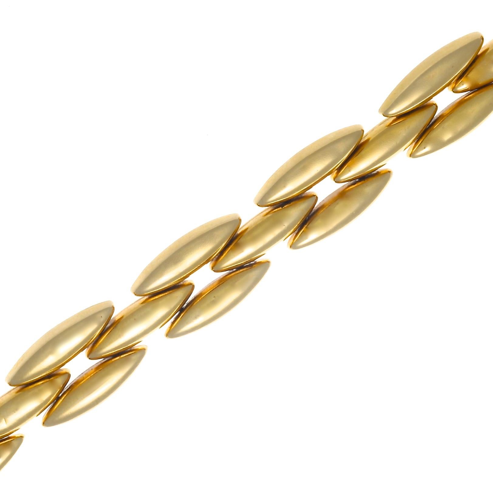 The perfect elegant 18k gold link bracelet to add to your favorites, but definitely makes the cut for wearing solo. Authentic 1990's signed Cartier Maillion Panther 18k gold bracelet. 26.9 grams. 7-1/2 inches long. Stamped with makers mark and 750