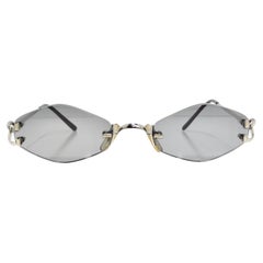 Vintage Cartier 1990s Silver Tone Rimless Sunglasses