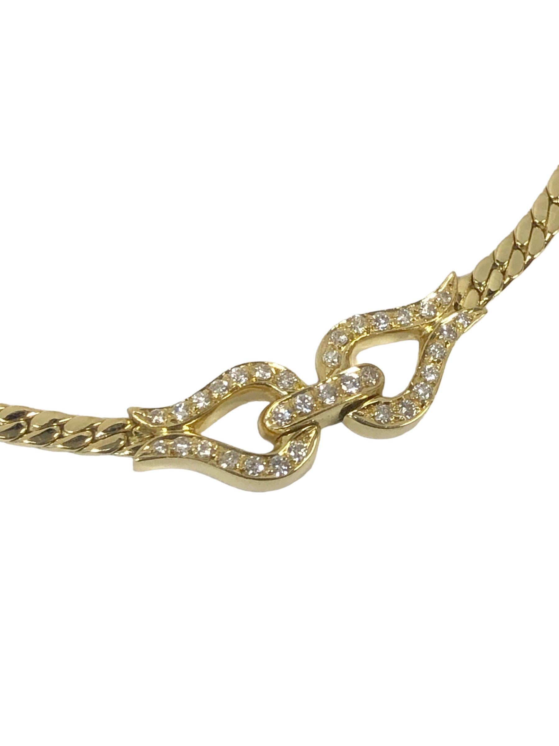 Circa 1990 Cartier 18k Yellow Gold Necklace, 3 M.M. wide Curb link chain with a central section set with 33 Round Brilliant cut Diamonds totaling .30 Carat. 14 inches in length and can be made longer if desired. Tongue lock with safety clasp.