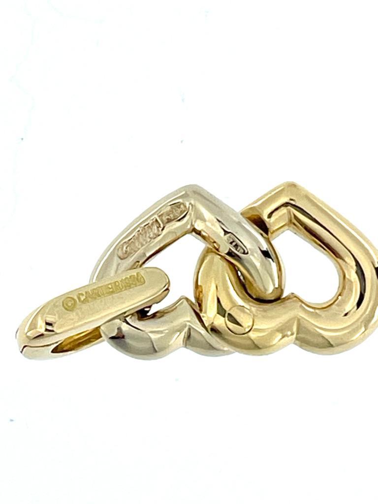 Cartier 1994 Double Heart Charm 18 karat Yellow and White Gold In Excellent Condition For Sale In Esch-Sur-Alzette, LU