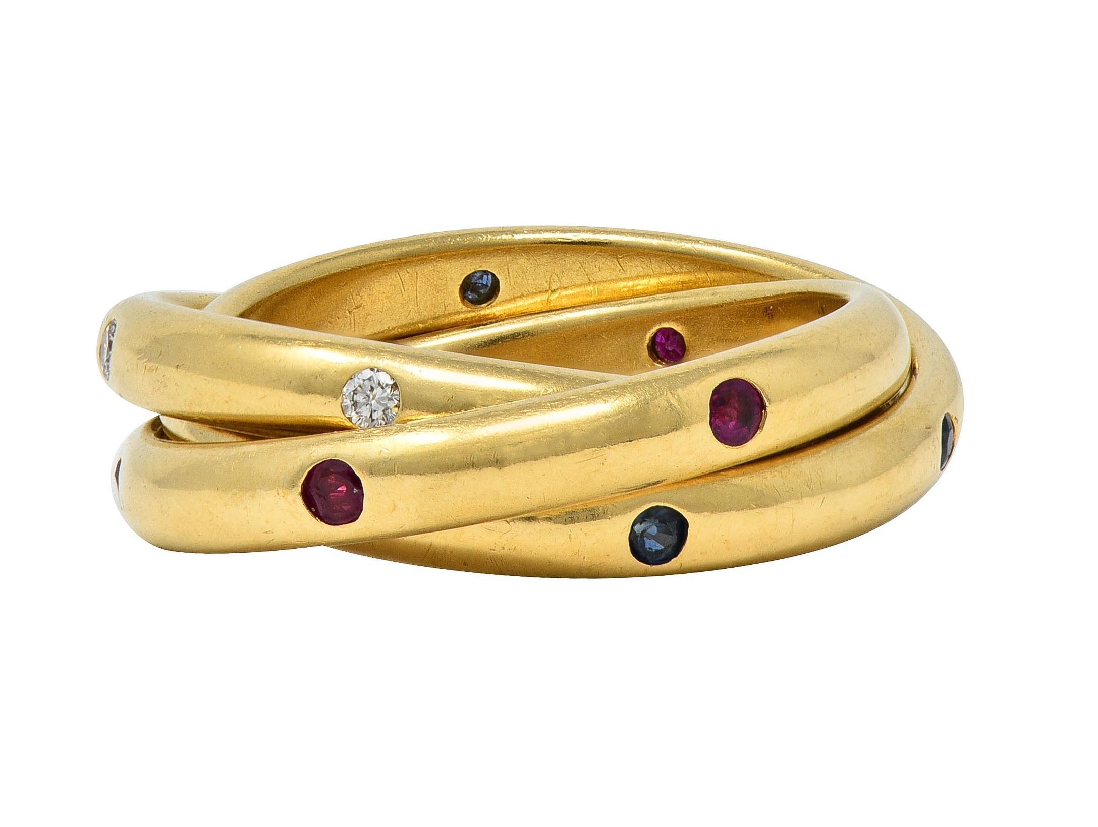 Cartier 1995 French Diamond Sapphire Ruby 18K Gold Vintage Rolling Band Ring In Excellent Condition In Philadelphia, PA