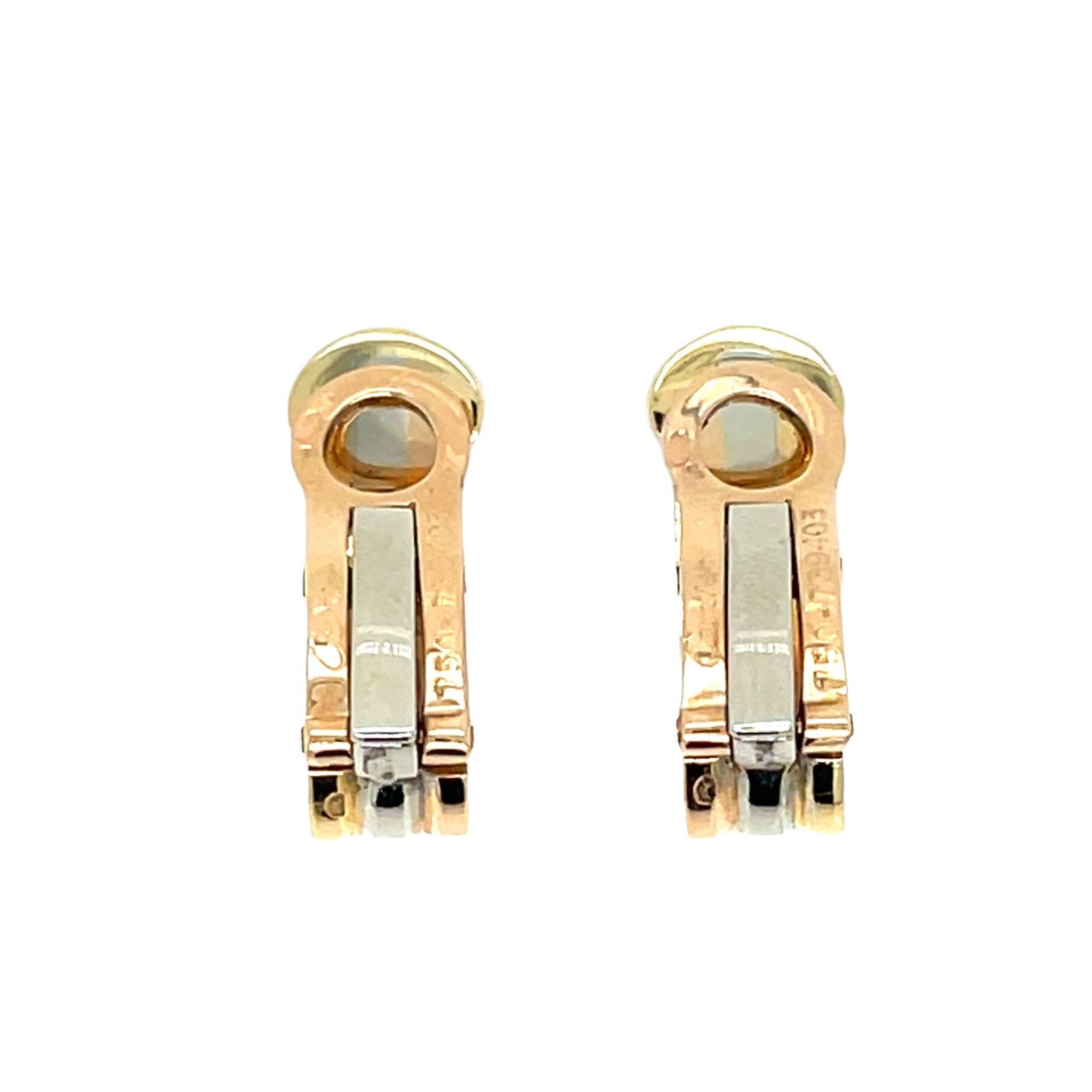 These Cartier 2C Trinity clip-on earrings are crafted in 18K rose, white and yellow 18 kt gold, displaying a harmonious blend of colors. 
France 1988.

CONDITION: Pre-owned - Excellent 
METAL: 18k white Gold 
MEASURES: Lenght 1,72 cm;  width 0.54