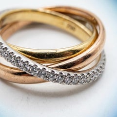 Cartier 3-farbiger „Trinity“-Rollring aus 18-karätigem Gold mit 2-Karat-Diamanten