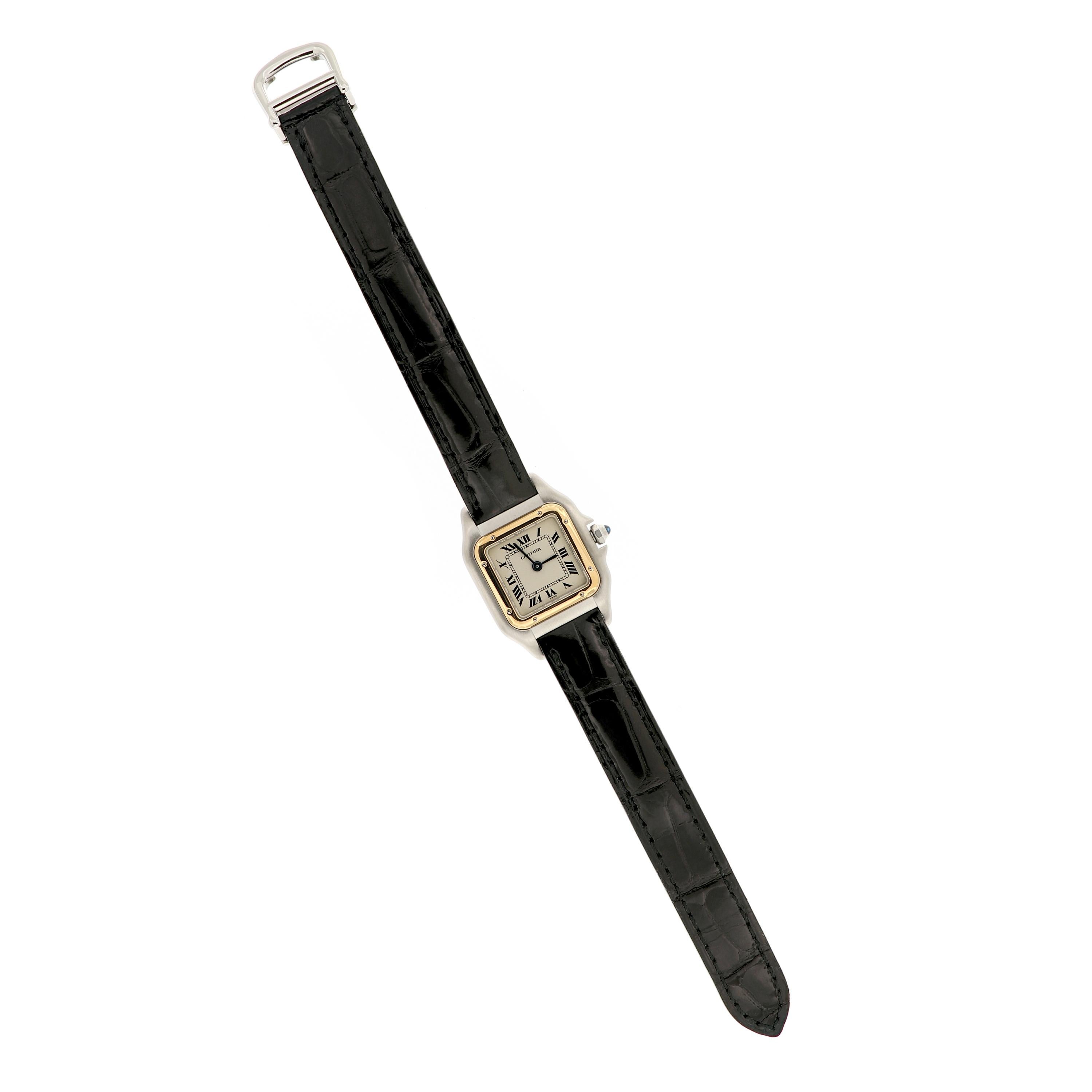 Ladies Cartier Panthere 18k yellow gold and stainless steel watch features a quartz movement, black crocodile strap and stainless steel deployment closure. This previously owned watch is in great condition with brand new strap. Model Number, OR ET