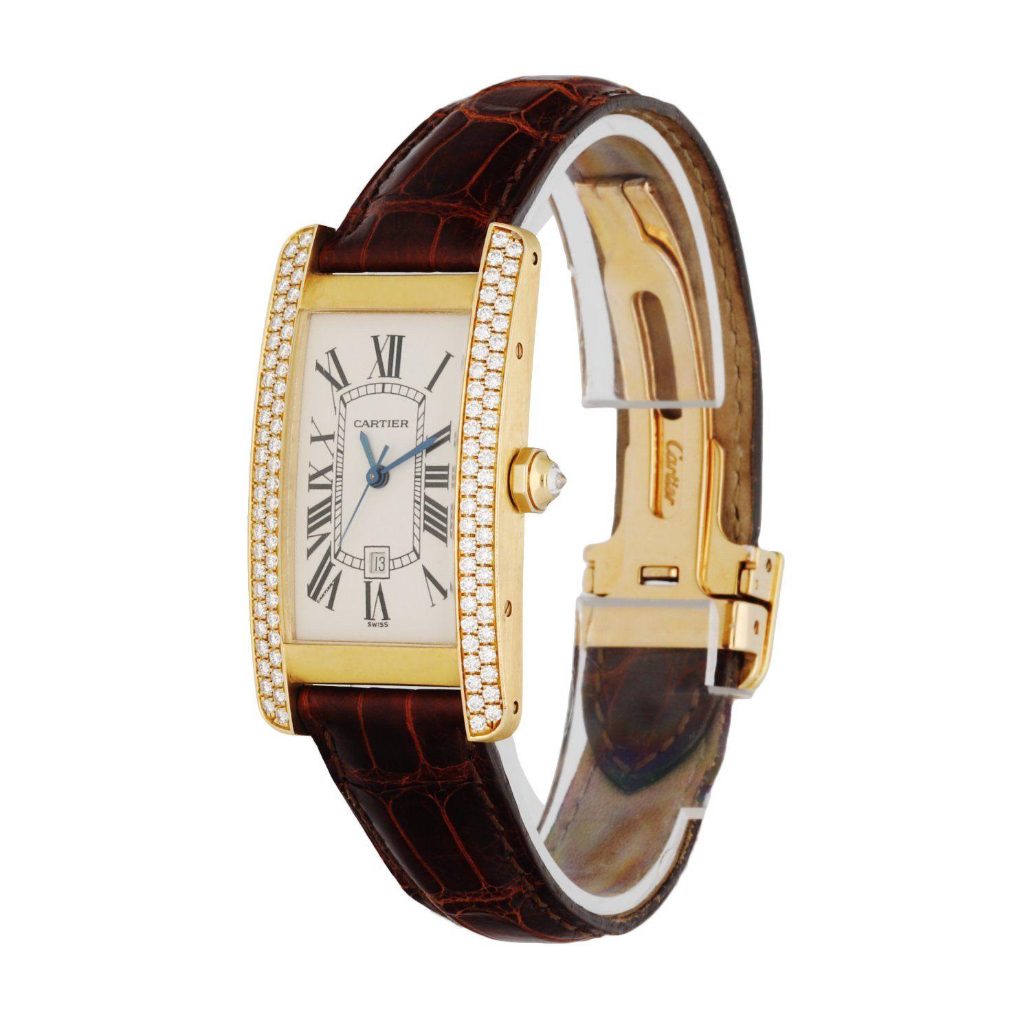 Cartier Tank Americaine 2483 ladies watch. 23mm 18K yellow gold case with factory set diamond bezel. Off-white dial with blue hands and black Roman numerals hour marker. Minute marker in the inner dial. Date display at 6 o'clock position.