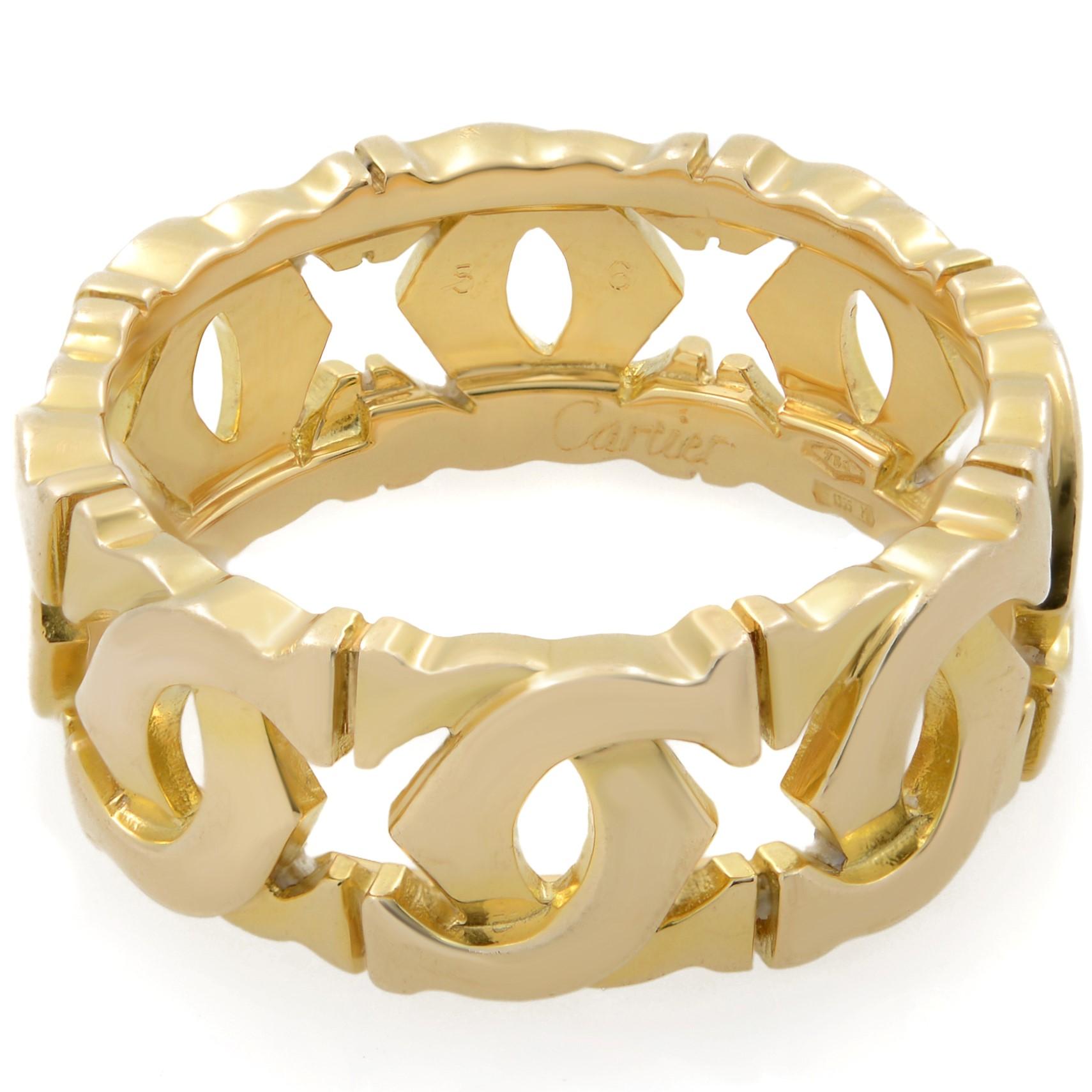 Cartier 18K Yellow Gold 2C Entrelaces Ring. Size 56 US 7.5. Width: 8.00mm. Hallmarked with brand name, gold type and serial number. Excellent pre-owned condition. Original box and papers are not included. 
