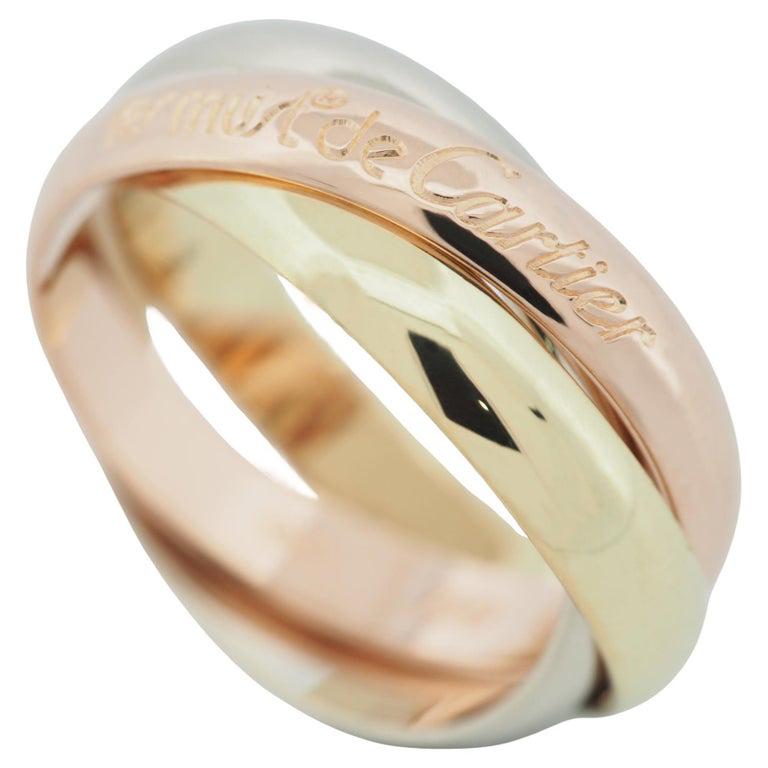 Item: Authentic Cartier 3 Bands Trinity Ring
Stones: ---
Metal: 18K Yellow / Rose / White Gold
Ring Size: 52 US SIZE 5.75 UK SIZE K 3/4
Internal Diameter: 16.35 mm
Measurement: 3.4 mm width ( each band )
Weight: 8.2 Grams
Condition: Used