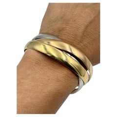 Bracelet Trinity Cartier en or tricolore, portant la marque de Jean-Jacques Cartier, 123 g