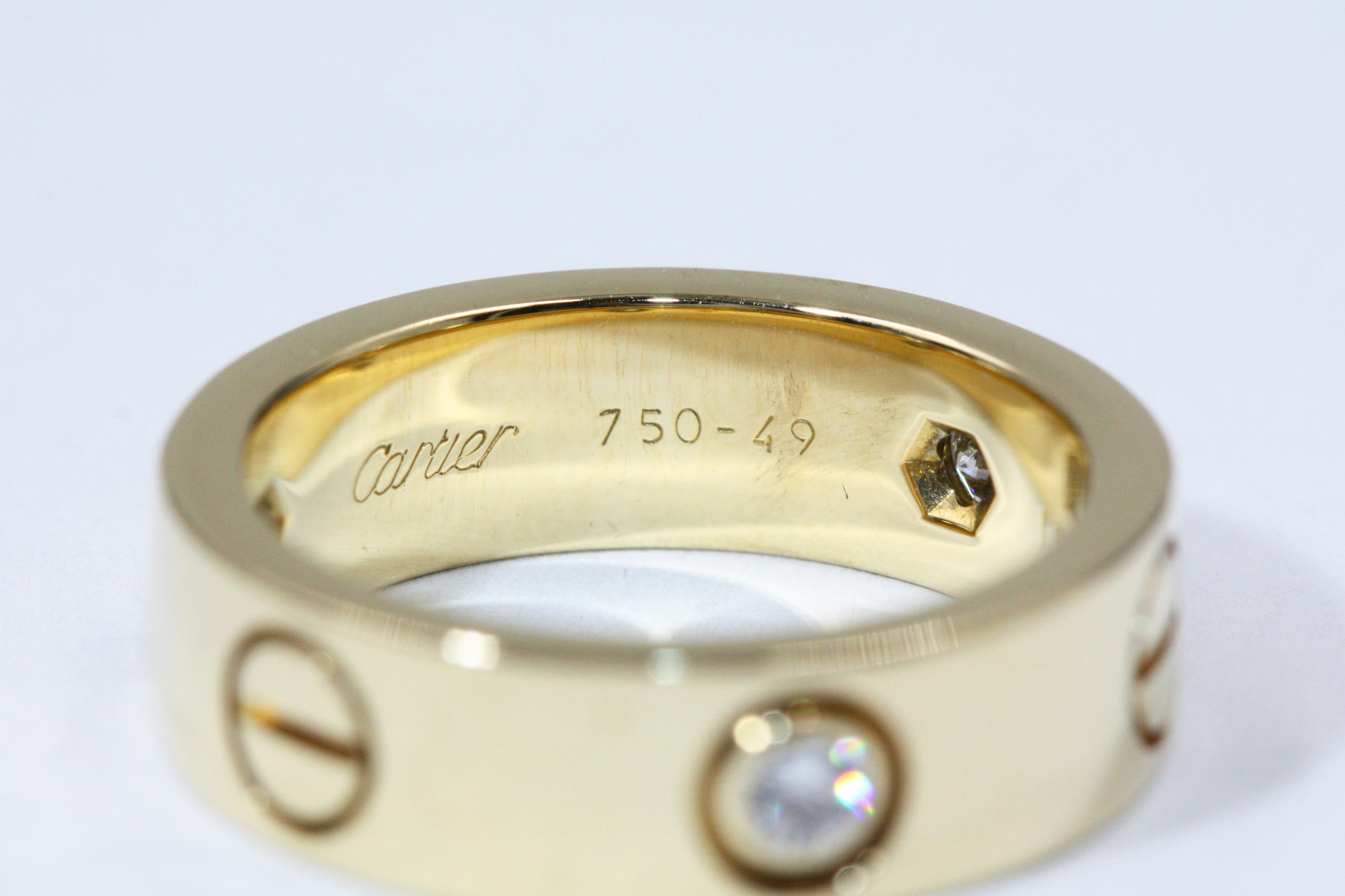 Cartier 3 Diamonds Love Ring, Yellow Gold In Good Condition For Sale In New York, NY
