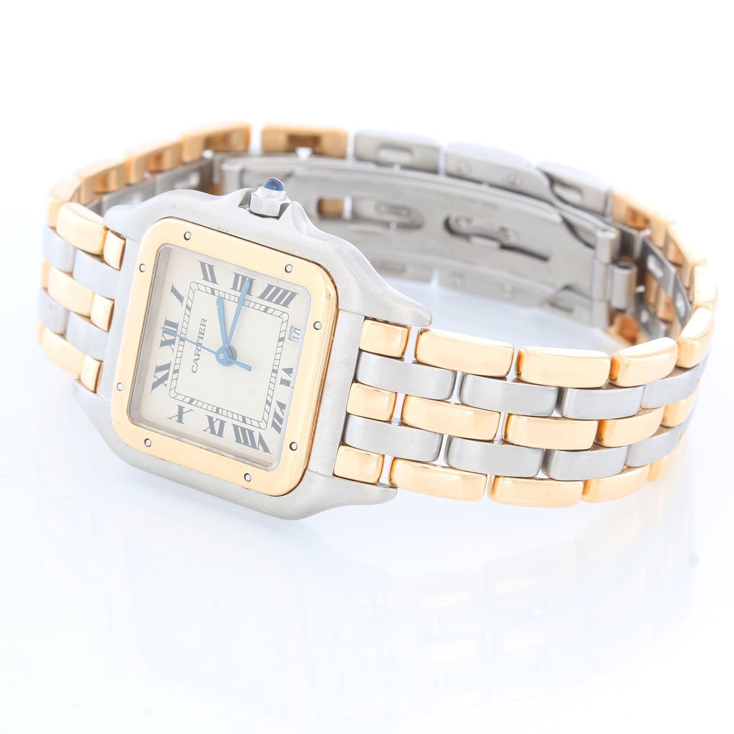 Cartier 3-Row Panther 2-Tone Steel & Gold Watch - Quartz. Stainless steel case with 18k yellow gold bezel (27mm x 37mm). Ivory colored dial with black Roman numerals and date at 5 o'clock. Stainless steel and 18k yellow 3-row Cartier Panther