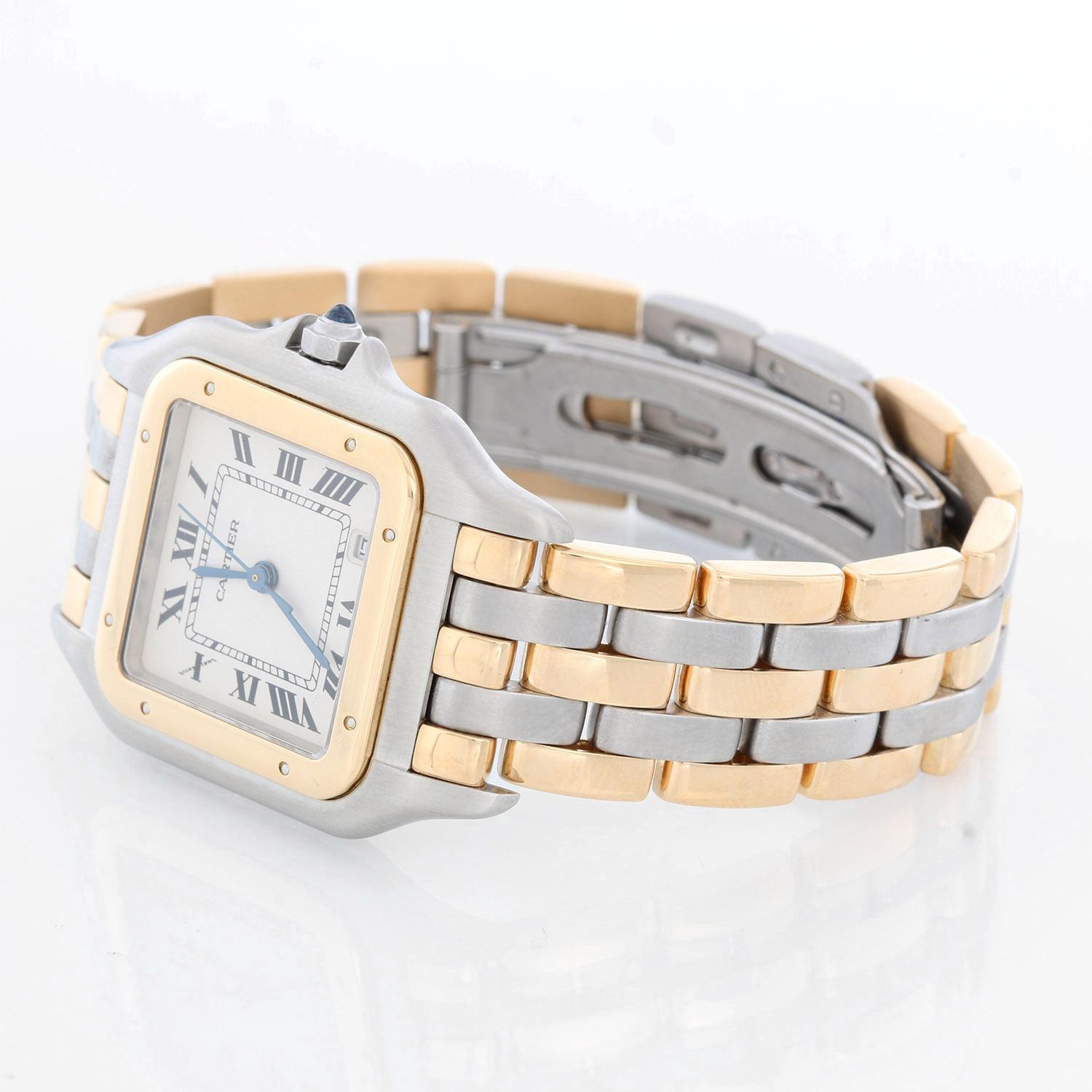 Cartier 3-Row Panther 2-Tone Steel & Gold Watch W25027B8 - Quartz. Stainless steel case with 18k yellow gold bezel (29mm x 40mm). Ivory colored dial with black Roman numerals and date at 3 o'clock. Stainless steel and 18k yellow 3-row Cartier