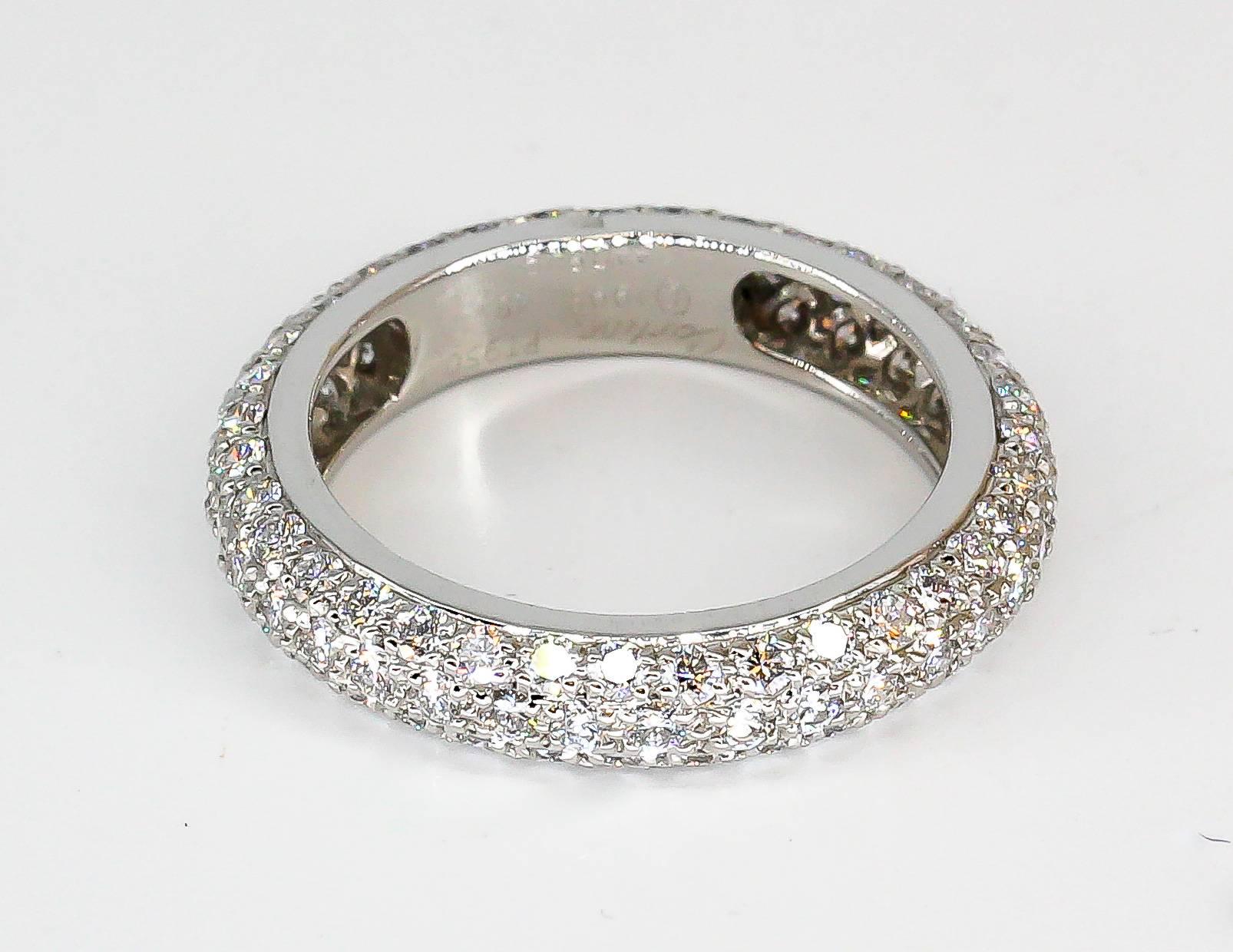 Elegant 3 row pave diamond and platinum band by Cartier. It features high grade round brilliant cut diamonds in 3 rows. Approx. size 4.5-5 (European size 48)

Hallmarks: Cartier, 1995, PT 950, 48, reference numbers, maker's mark, platinum assay mark.