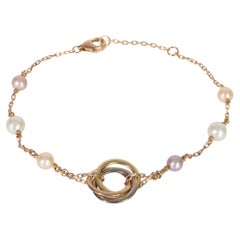 Bracelet trinité en or 3 tons avec perles de Cartier