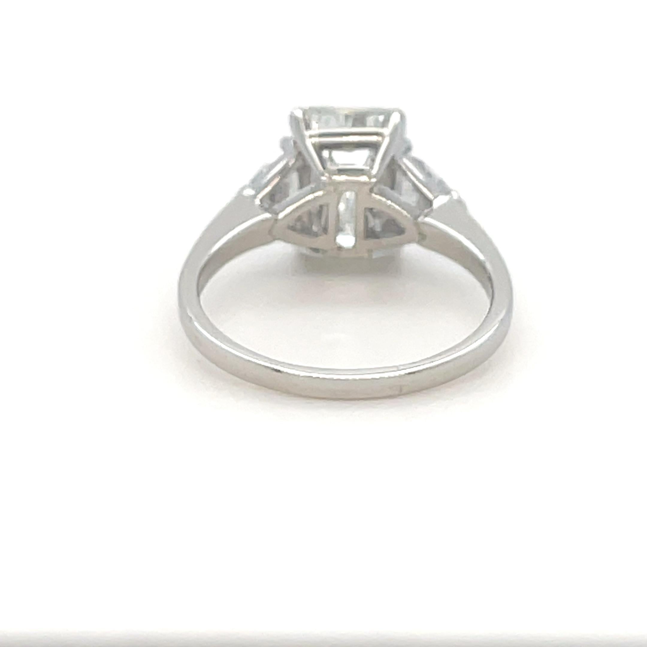 Cartier, 3.00 Carat Emerald Cut Diamond Engagement Ring In Excellent Condition For Sale In Chicago, IL