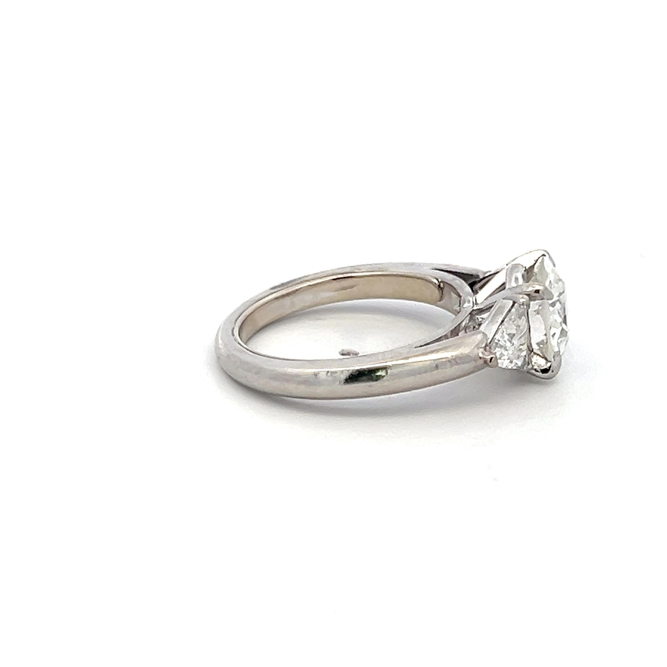 Designer:
CARTIER
Title:
Cartier 3.10 Carat Old European Cut I VVS2 and Triangular Shape G VS1 Diamond 18 Karat White Gold Engagement Ring
Style:
Engagement
Metal:
18 Karat White Gold
Gemstone 1:
0.7 Carat Diamond
Number of