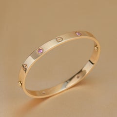 Cartier Bracelet Love 4 saphirs roses en or rose