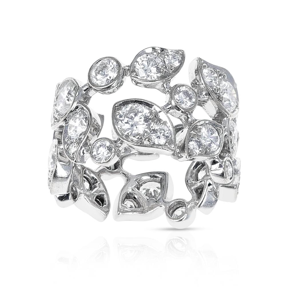 A Cartier Diamond Leaf Ring with appx. 5 carats of Diamonds, made in 18K White Gold. The total weight is 9.60 grams. The ring size is US 6. 

SKU: 508-ABJAJMZ