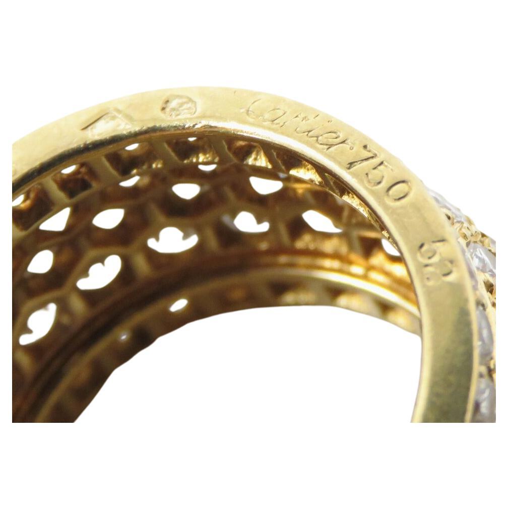 Introducing the CARTIER  5.00ct diamond ring

Marked: Cartier 750 52 18 630753

Ring band 13mm wide. Ring size 5.5

Total Weight : 10.7 grams