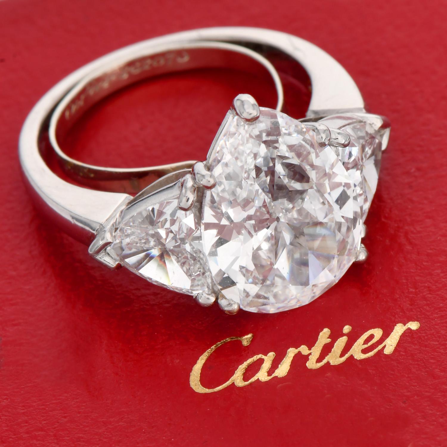 Dieser atemberaubende klassische Cartier Diamantring ist mit einem atemberaubenden birnenförmigen natürlichen Diamanten mit einem Gewicht von 4,07cts, E Farbe, VS1, in einer schönen Platinfassung zentriert.

Dies ist ein tadelloser Diamantring.