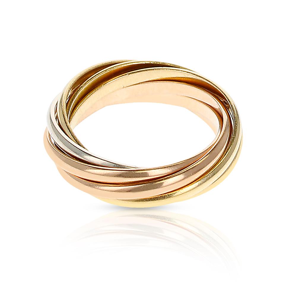 A Cartier 7 Band Rolling Ring made in 18 Karat Rose, White and Yellow Gold. Ring Size 5.50. Total Weight: 7 grams. 
 