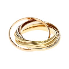 Cartier 7 Band Rolling Ring, 18 Karat Rose, White and Yellow Gold