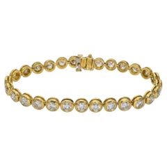 Cartier 7 Carat Diamond Bezel Set 18k Yellow Gold Tennis Bracelet