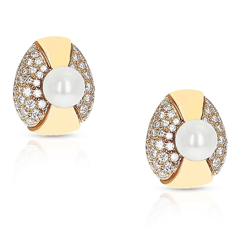 A beautiful pair Cartier 8MM Pearl and Diamond Oval-Shape Earrings made in 18 Karat Yellow Gold. The length is 0.65