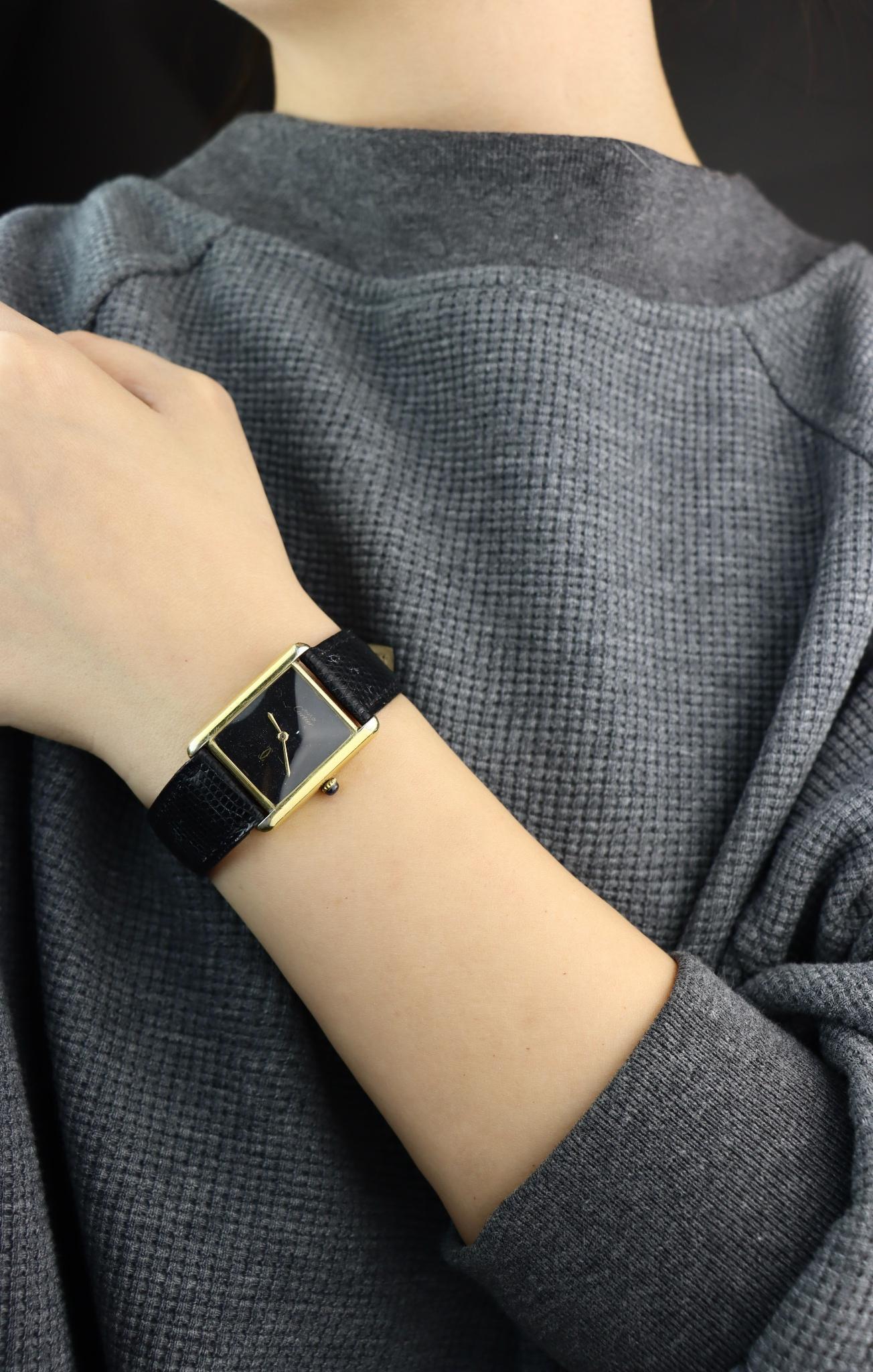 Cartier 925 Silver Gold Plated Quartz Watch

Marked:
Cartier
Paris
925
ARGENT PLAQUE OR 6 20M
SWISS

Approximate Dimensions:
23 cm ( Length) 
28mm x 23 mm (Dial) 
29.6 grams in weight
