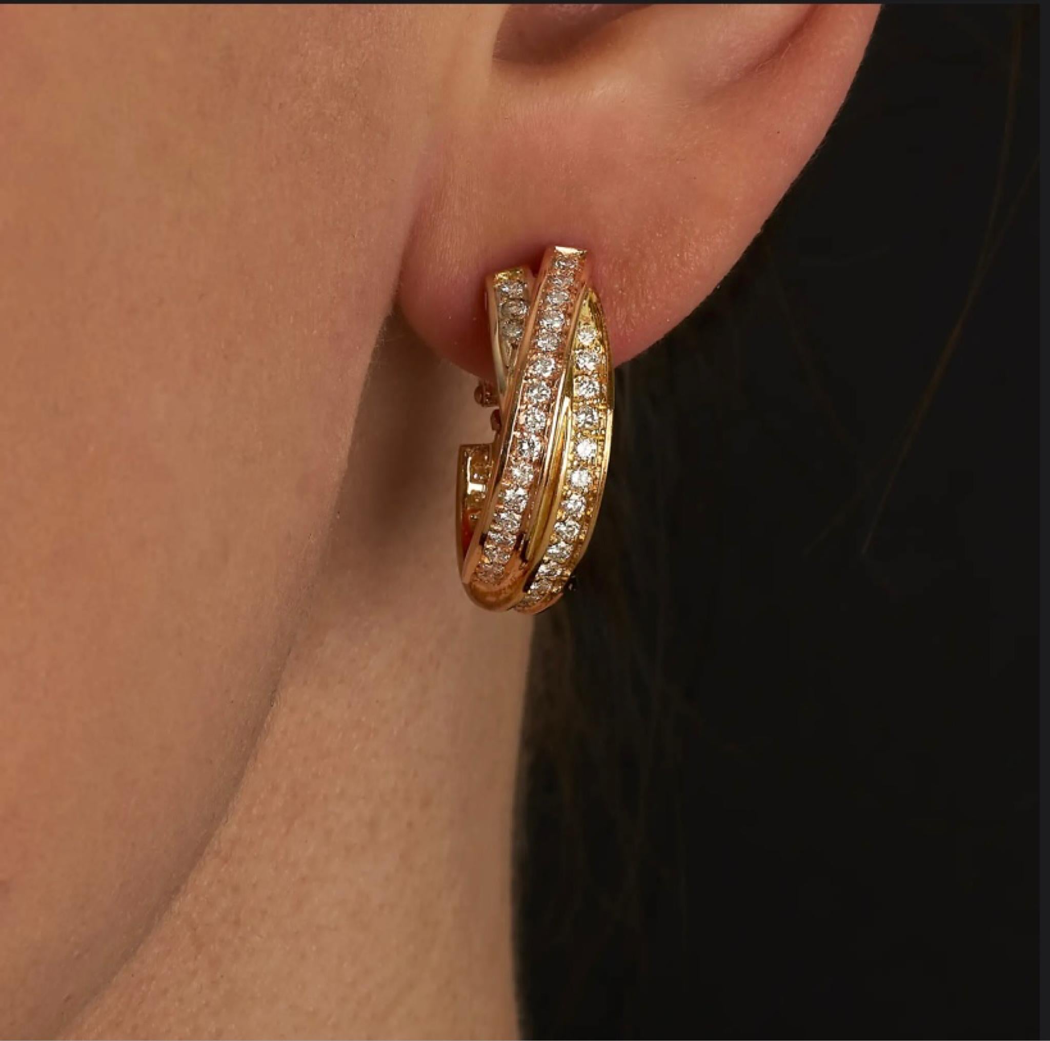 Brilliant Cut Cartier a pair of “Trinity” diamond earrings set with case and certificate