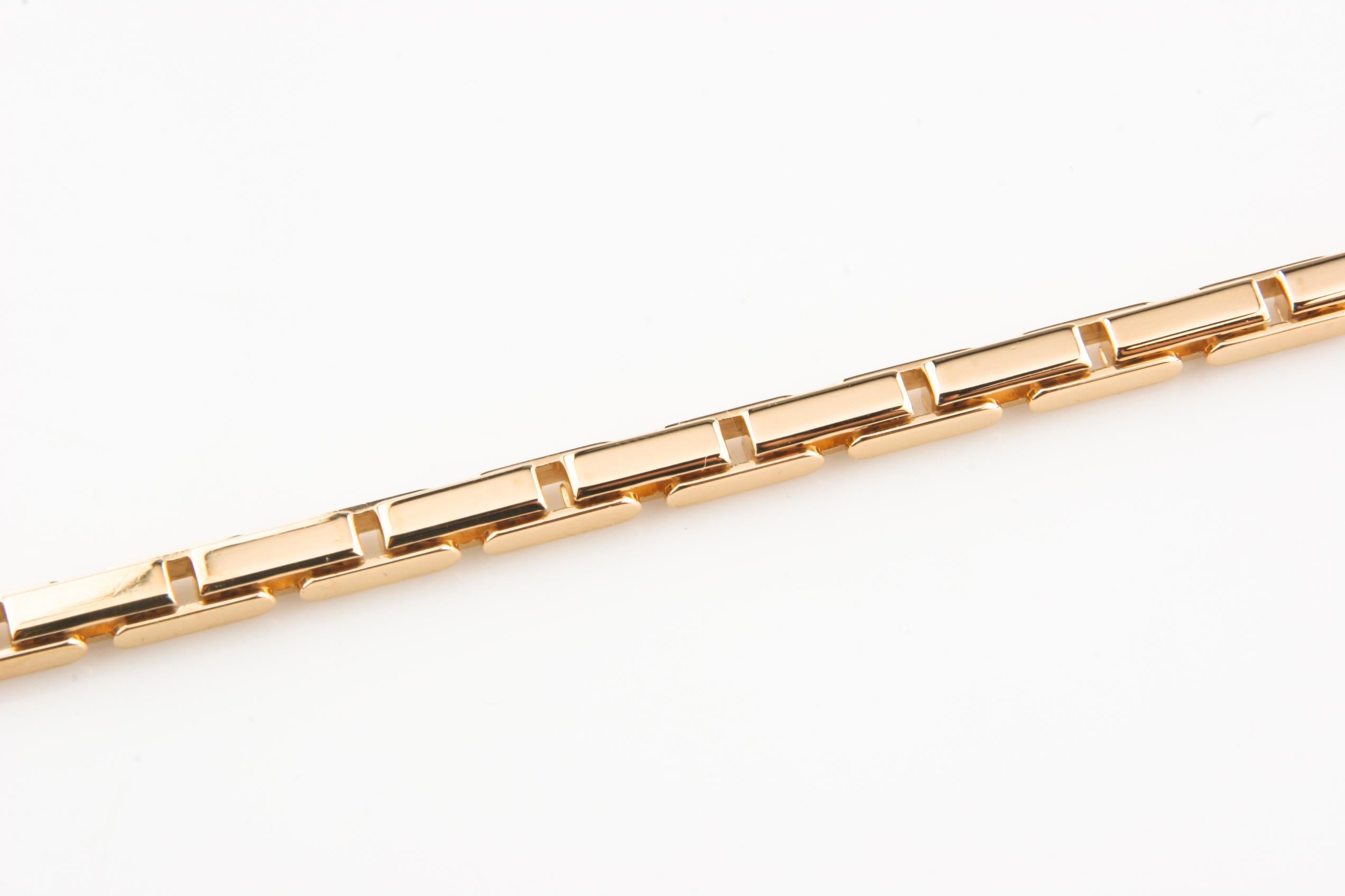 Gorgeous Cartier Agrafe 18k Yellow Gold Bracelet
Features Trademark Agrafe Hook-and-Eye Clasp
Total Mass = 33.3 grams
Length = 7.25