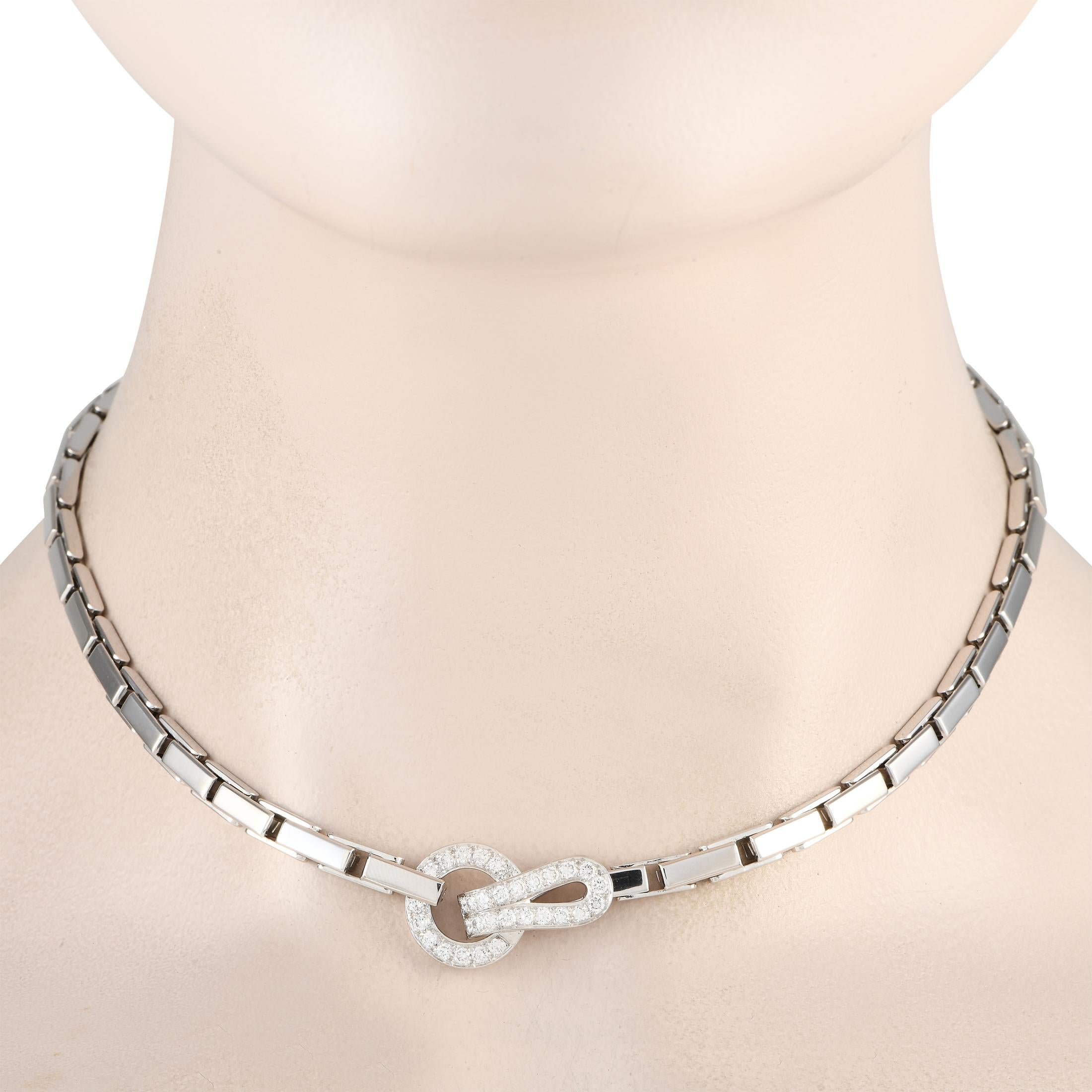Taking inspiration from the hook-and-eye fastening of haute couture corsets, here is a Cartier necklace from the Agrafe Collection. It features a white gold necklace chain, detailed at the center, with a diamond-paved clasp centerpiece. There is no