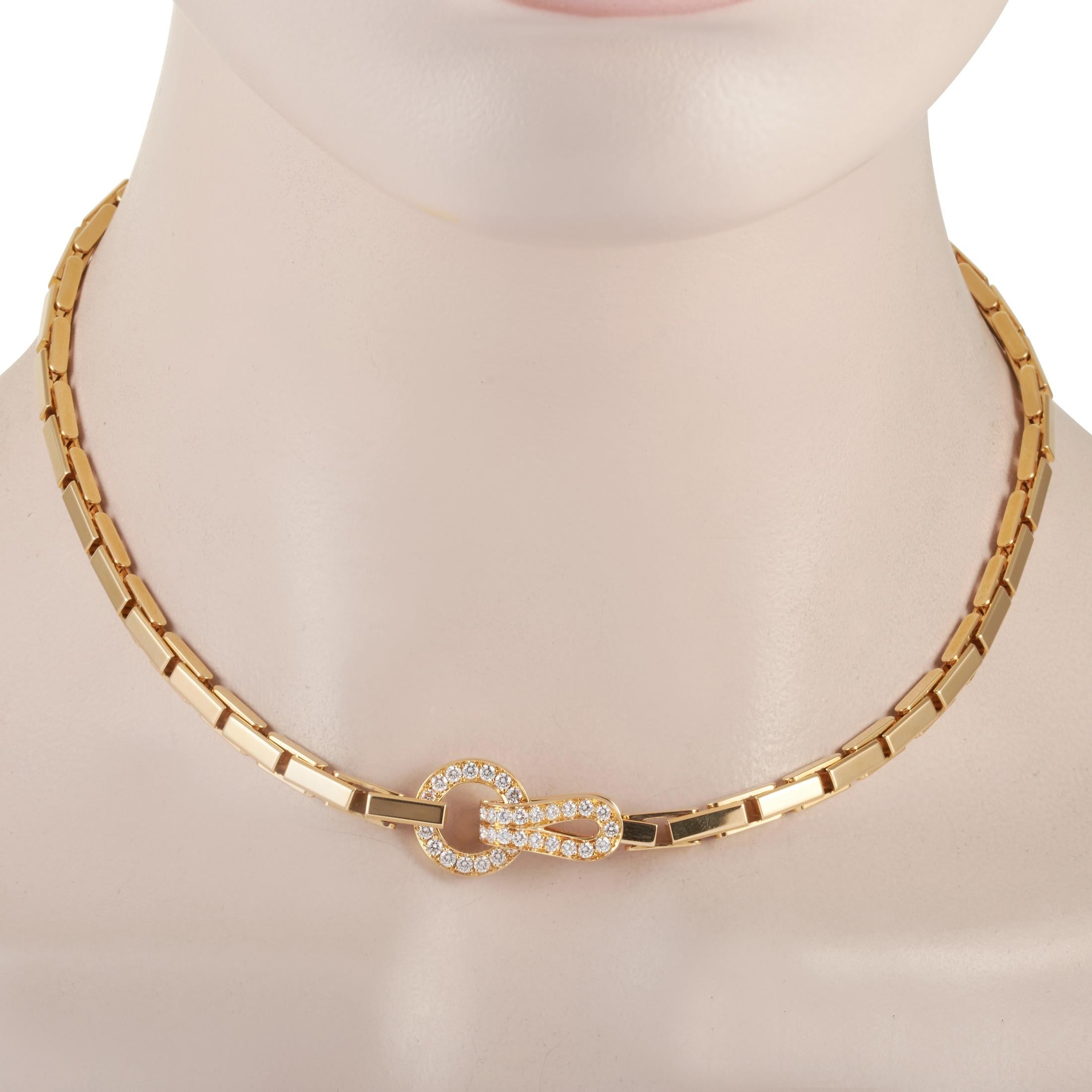 The Cartier “Agrafe” necklace is made of 18K yellow gold and embellished with diamonds. The necklace weighs 66.3 grams and measures 14.50” in length.
 
 This jewelry piece is offered in estate condition and includes the manufacturer’s box.
