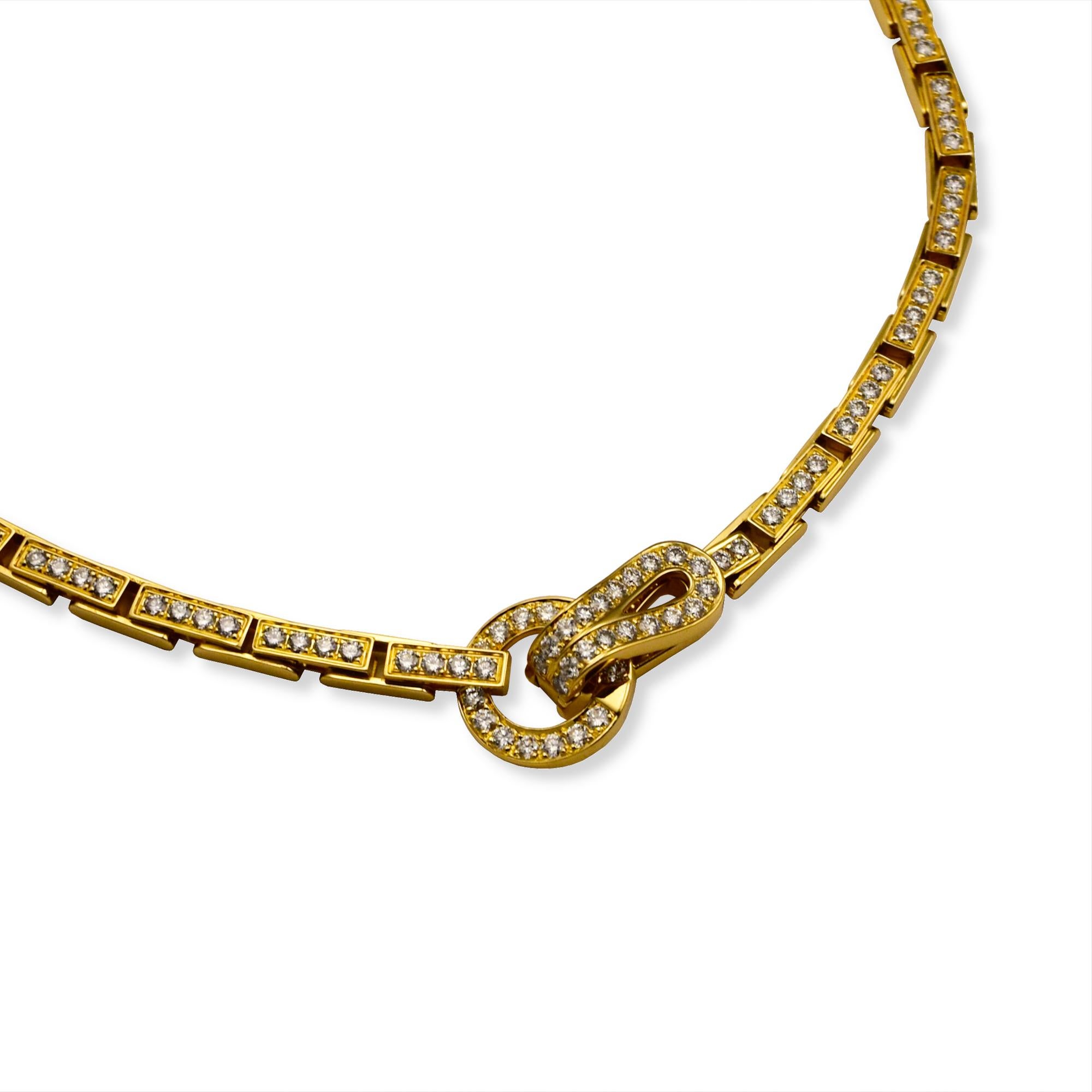 Brand: Cartier

Collection:  Agrafe

Style:  Pendant Necklace 

Metal: Yellow Gold

Metal Purity :18K

Stones: Round Brilliant Cut

Necklace Length:  15.5 inches 

Pendant Size:  1 inch 

Total Item Weight(Grams): 55.8 

Hallmark: Cartier; 18k;