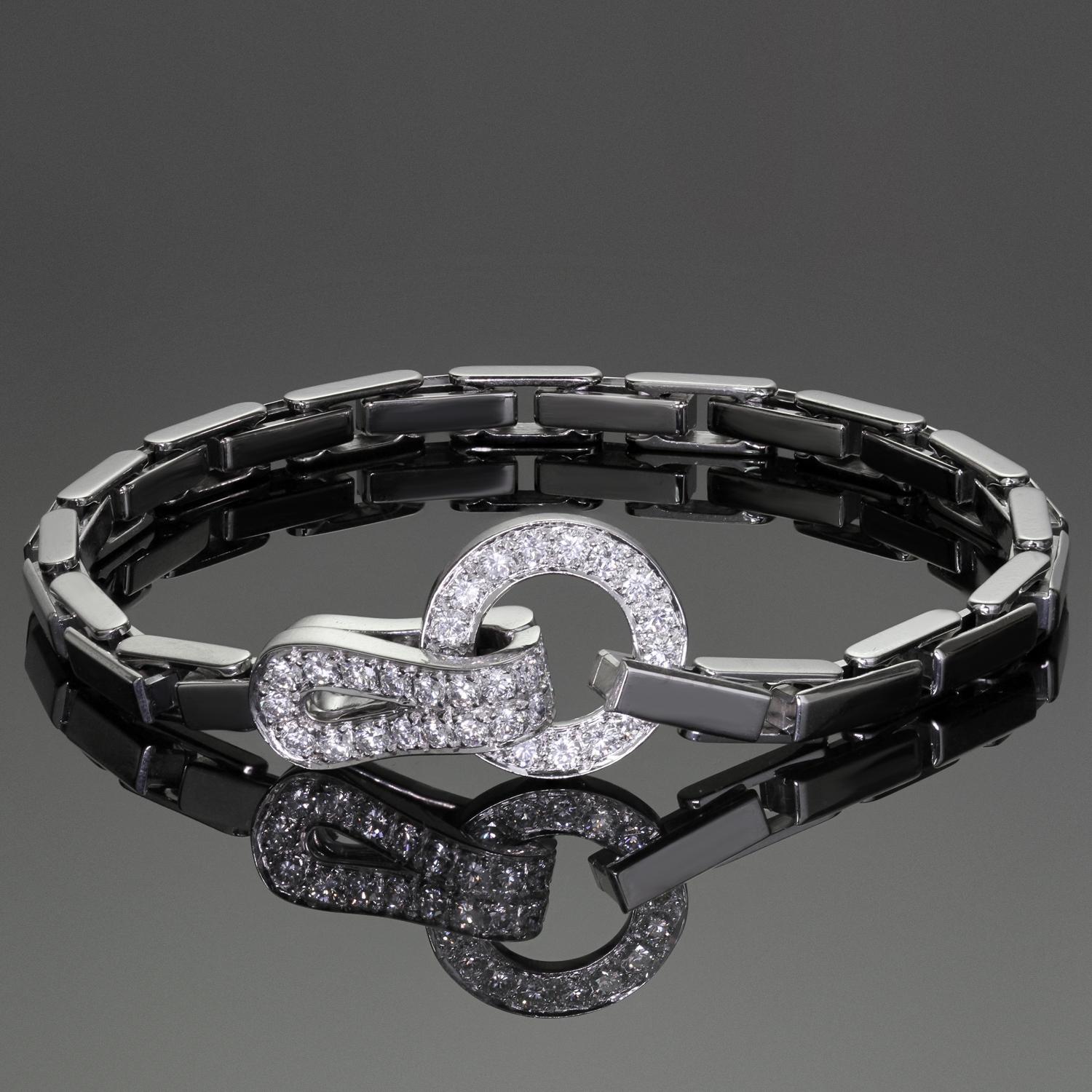 This fabulous Cartier bracelet is crafted of 18k white gold and set with round brilliant-cut D-E-F VVS1-VVS2 diamonds weighing an estimated 1.15 - 1.20 carats. Cartier's Agrafe collection is inspired by Haute Couture fashion with its central element