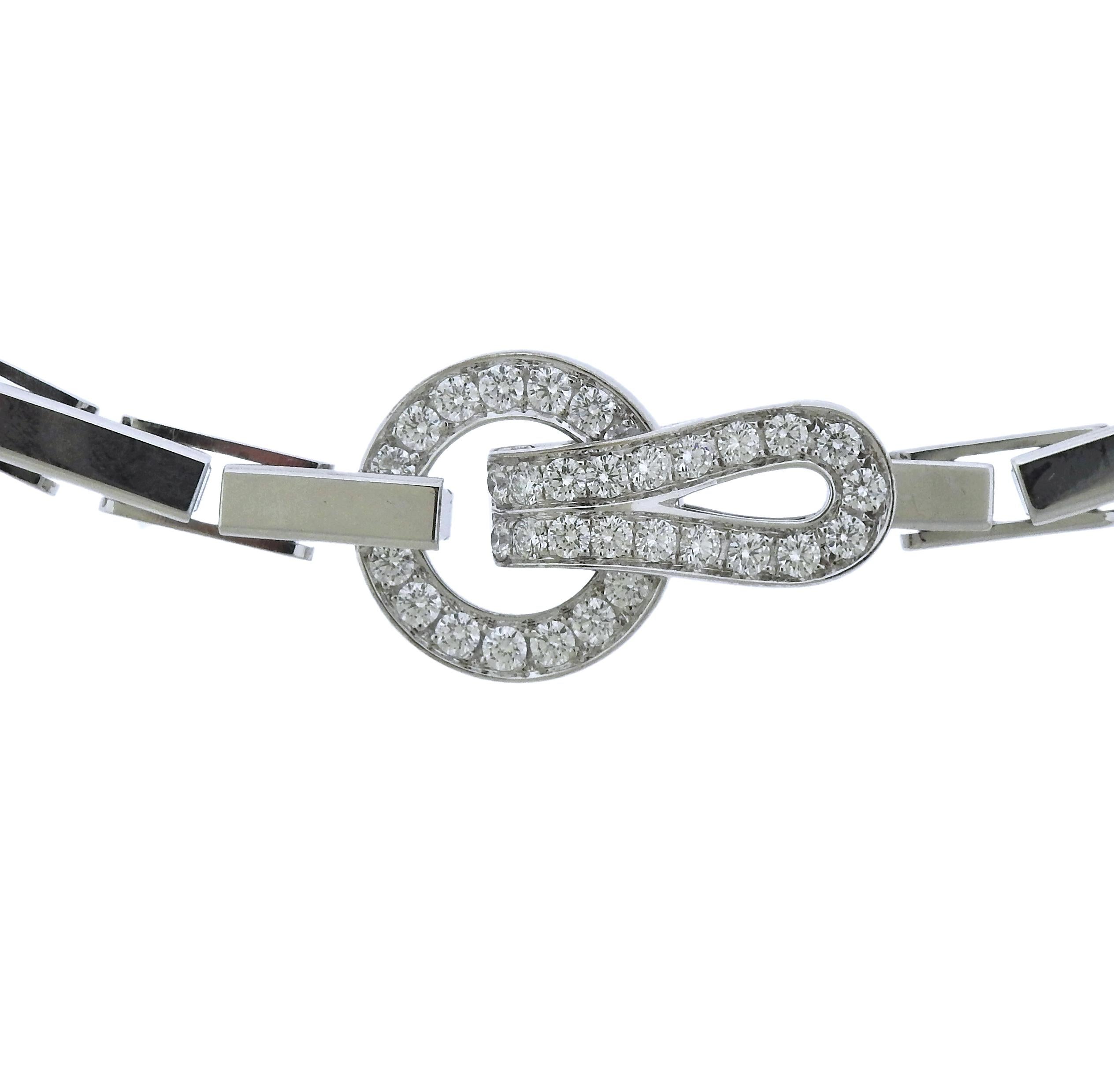  Classic  18k white gold Agrafe necklace by Cartier, adorned with approximately 1.36ctw in G/VS diamonds. Necklace is 16 3/4