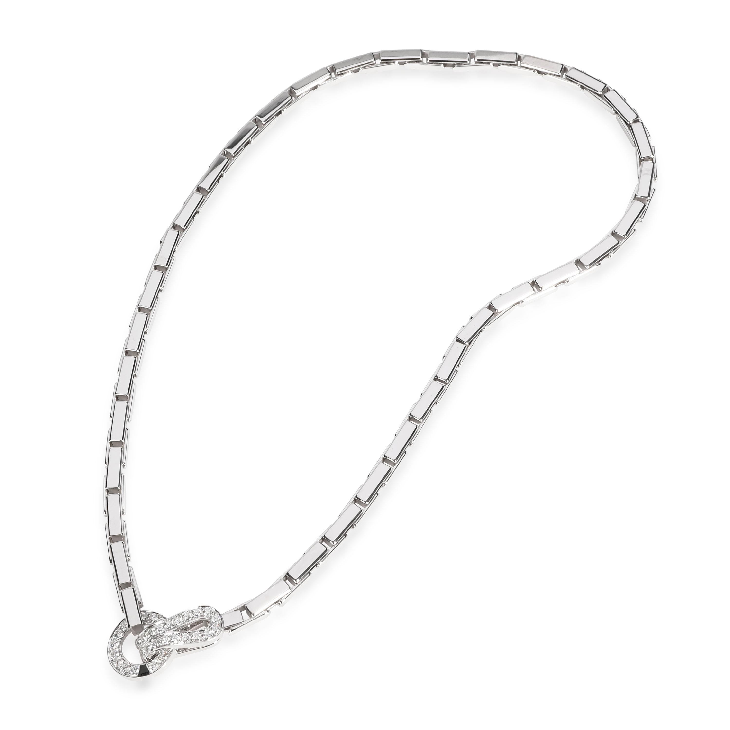 Retails for 27,000 USD. In excellent condition and recently polished. 16 inches in length. Comes with Box, Valuation Report. Stamps are faint due to age.

Cartier Agrafe Diamond Necklace in 18K White Gold 1.10 CTW

PRIMARY DETAILS
SKU: