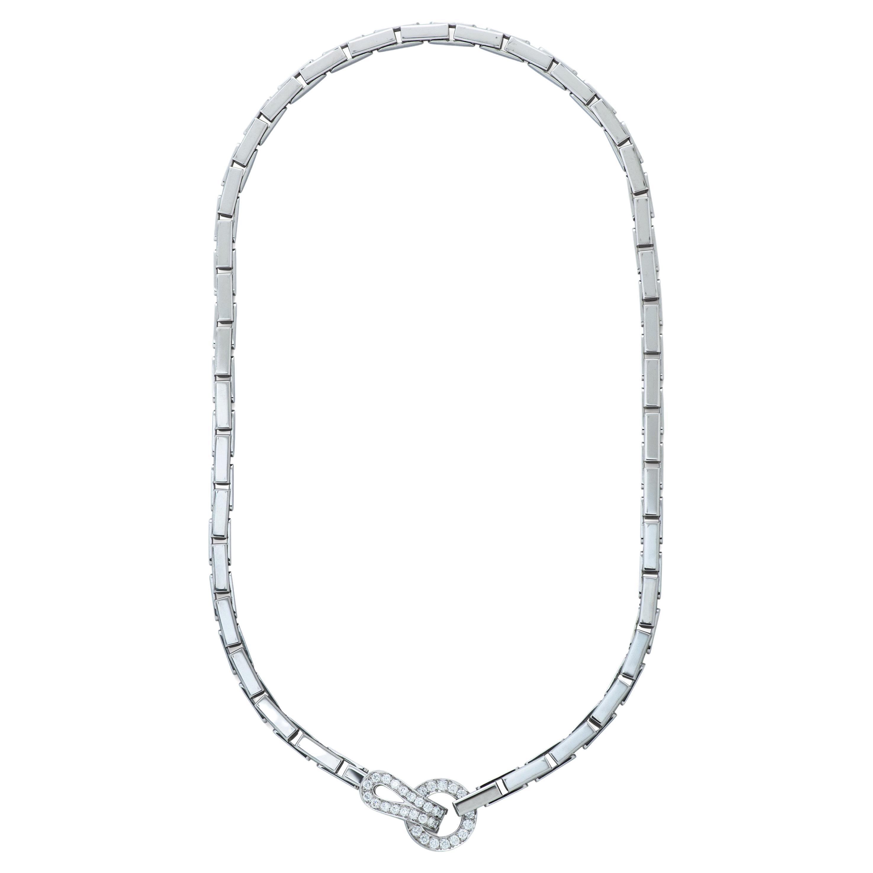 Cartier diamond link necklace in 18k white gold from the Agrafe collection, accompanied by Cartier certificate of authenticity. 

This necklace features 18k white gold brickwork links connected by a a hook and eye closure pave set with approximately