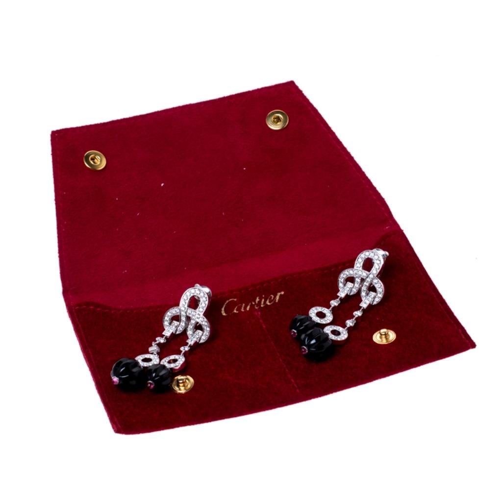 cartier agrafe earrings used