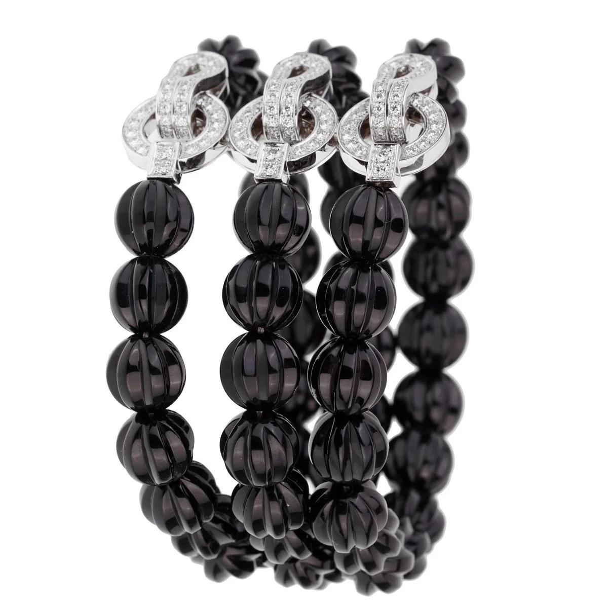Art Deco Cartier Agrafe Diamond Onyx White Gold Bracelet For Sale