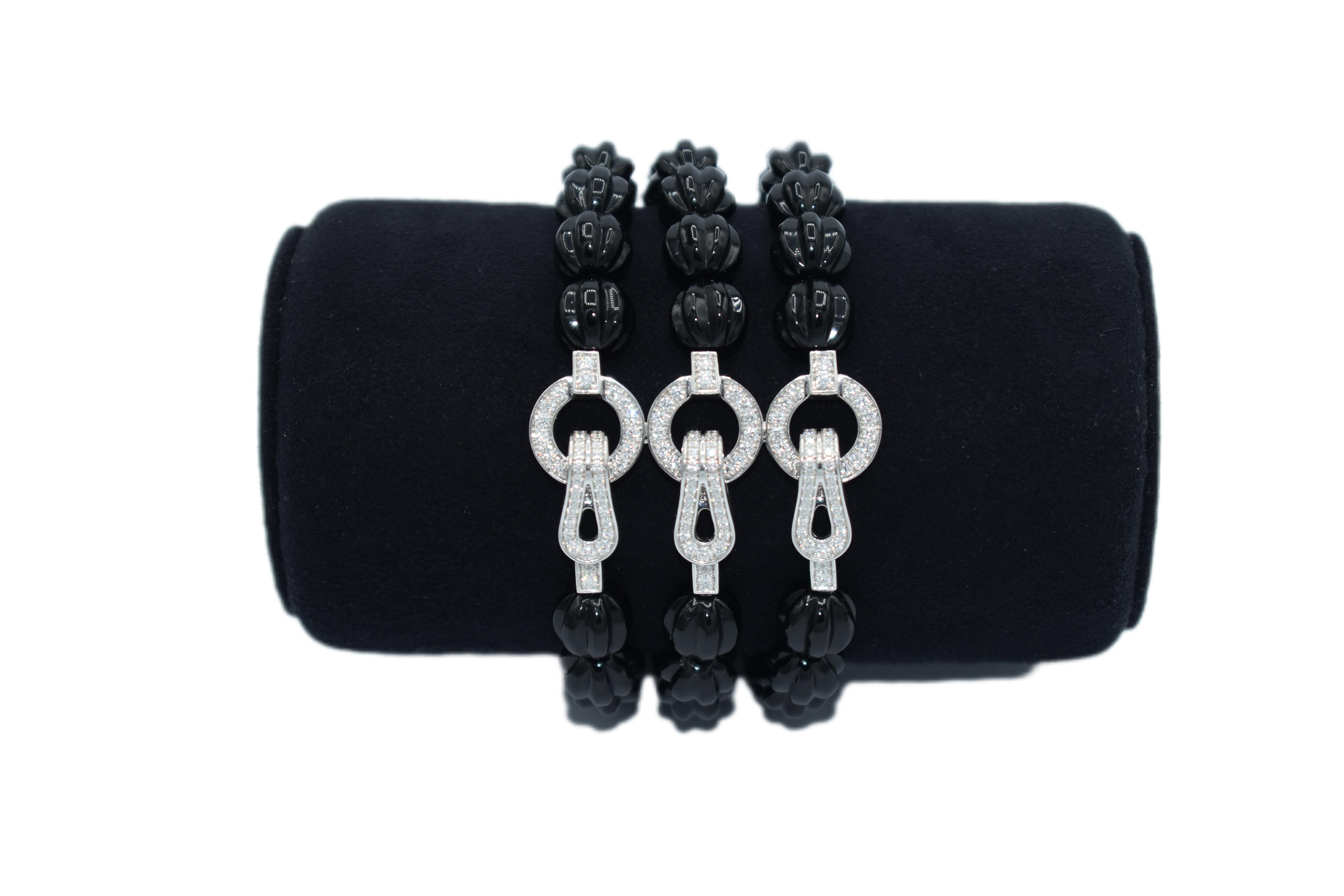 Brilliant Cut Cartier Agrafe Diamond Onyx White Gold Bracelet For Sale