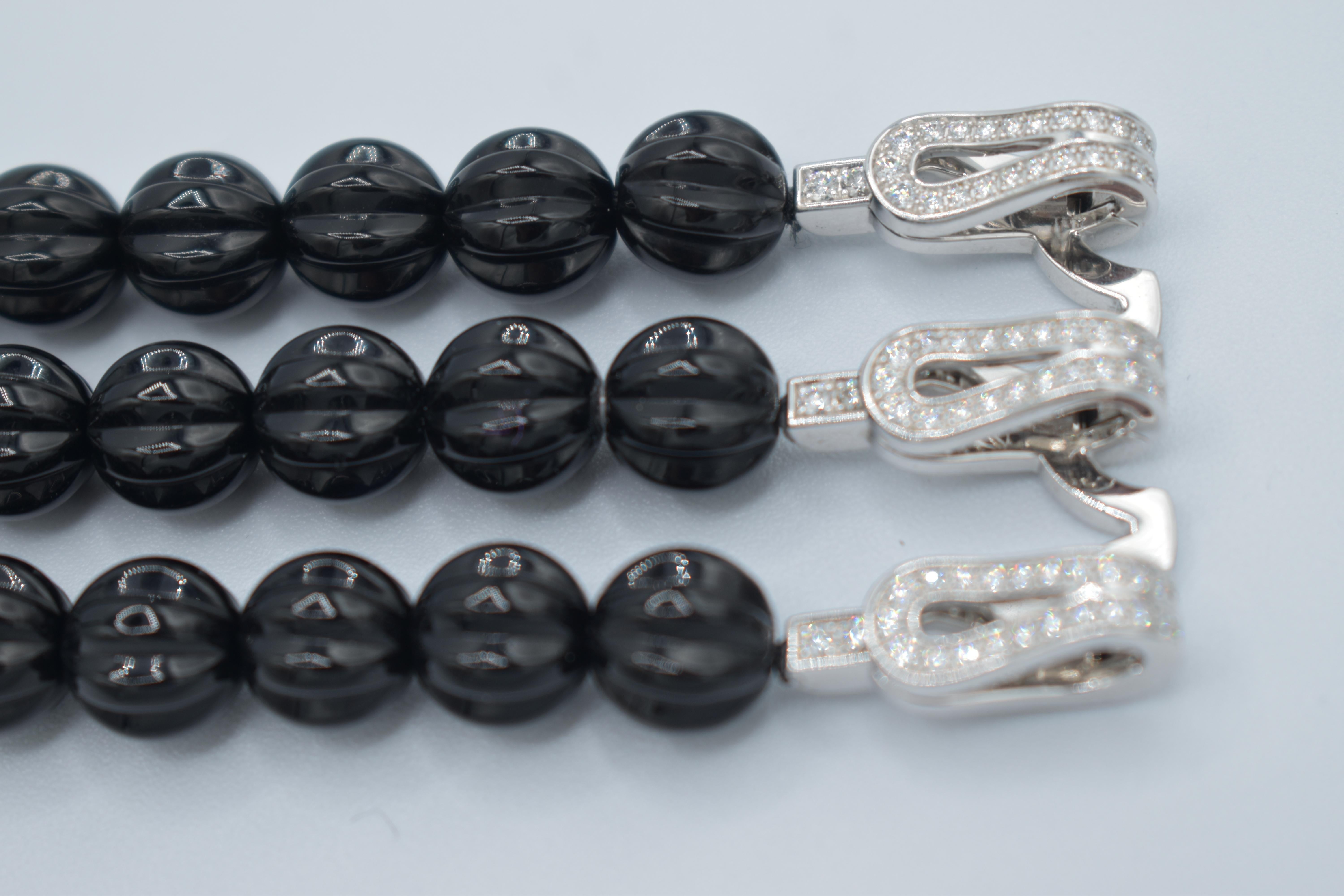 Women's Cartier Agrafe Diamond Onyx White Gold Bracelet For Sale
