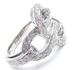 Cartier Agrafe, bague jonc en or blanc et diamants