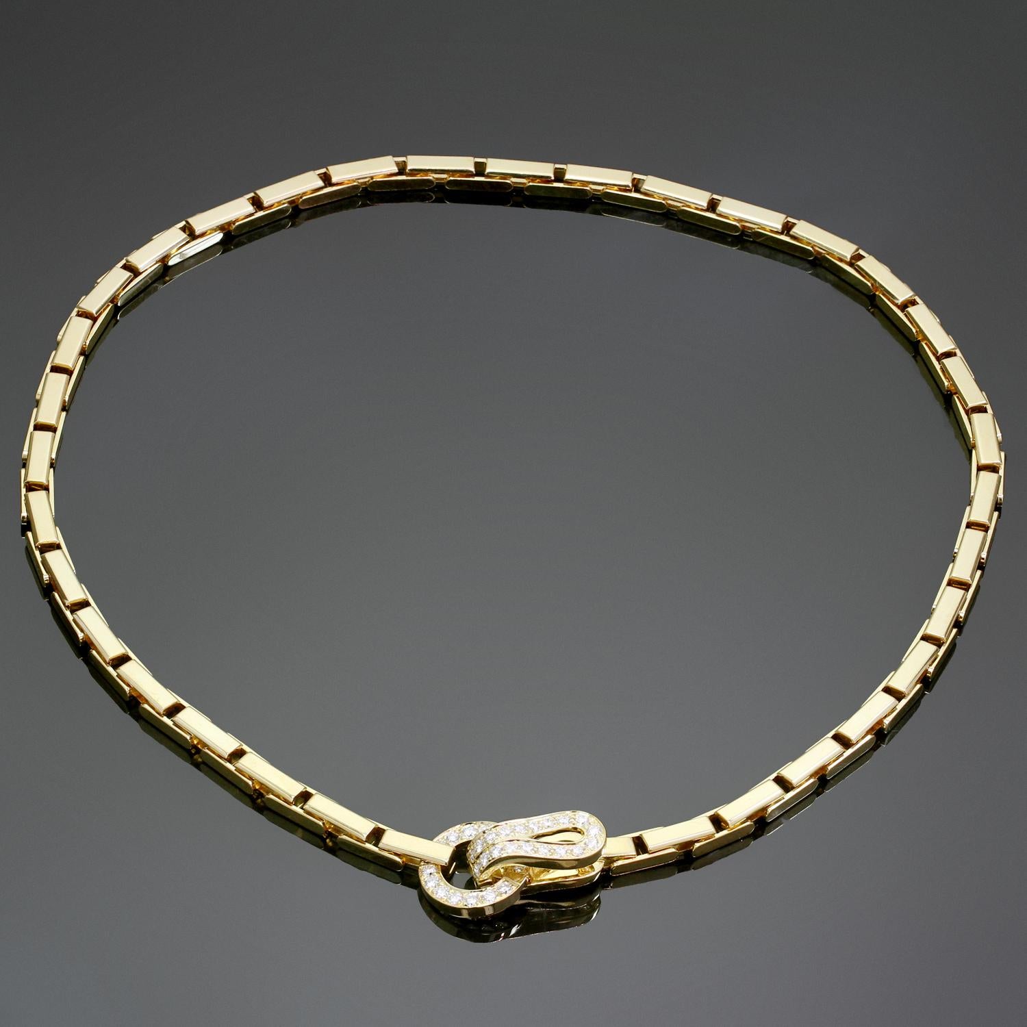 This iconic Cartier necklace is crafted of 18k yellow gold and set with round brilliant-cut D-F VVS1-VVS2 diamonds weighing an estimated 1.0 carat. Cartier's Agrafe collection is inspired by Haute Couture fashion with its central element being the