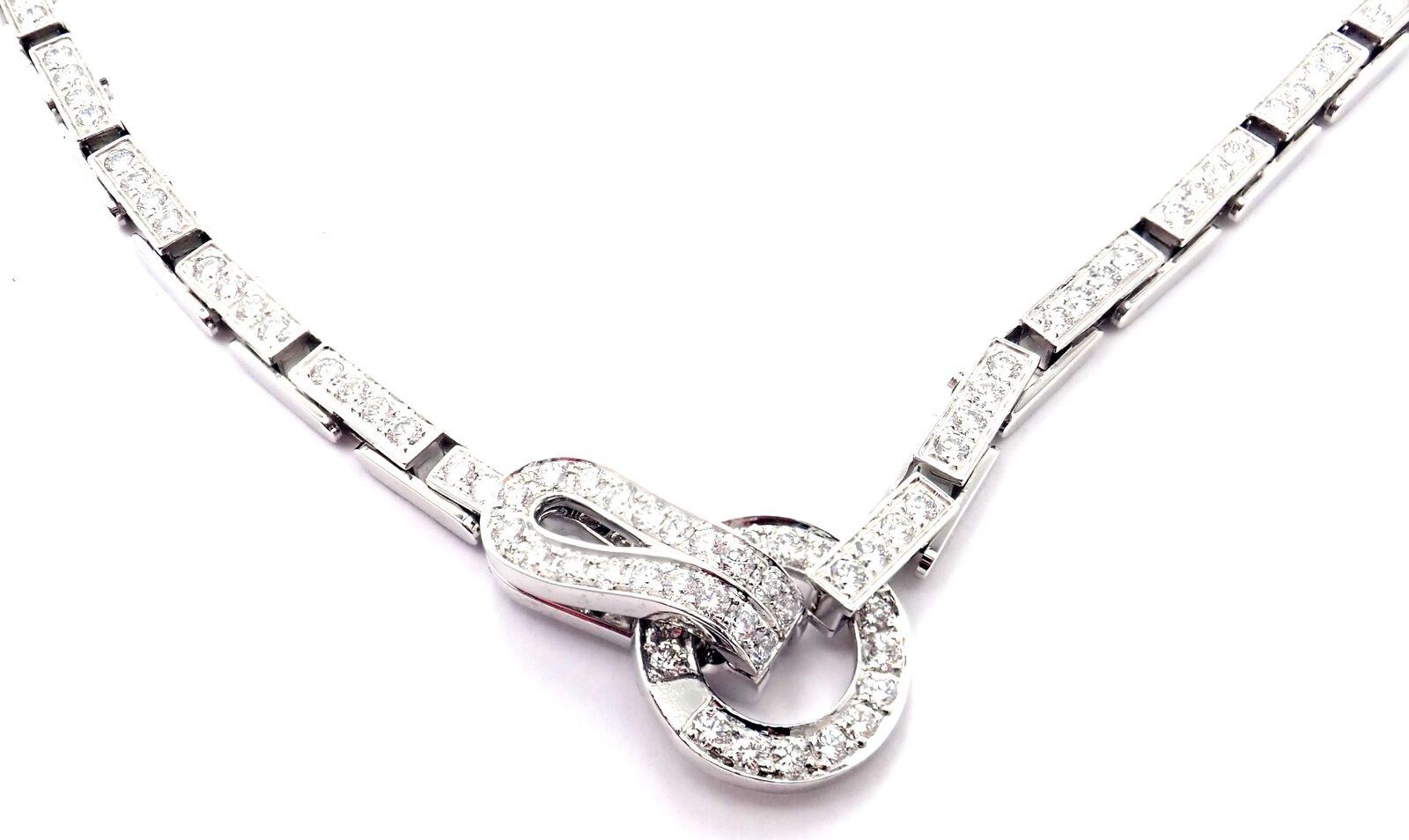 18k White Gold Diamond Agrafe Necklace by Cartier.
With Round Brilliant Cut Diamonds VVS1 clarity, E color total weight approximately 7.10ct
This necklace come with certificate of authenticity and a box from Cartier.
Details:
Length: 16.5