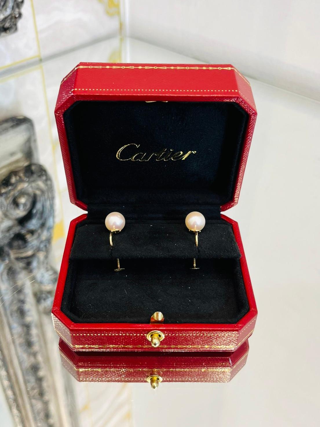 Cartier Akoya Pearl & 18k Gold Earrings

Rare Akoya pearl earrings with gold showing to the front, when wearing 

and screw back closure. For pierced ears.

Size - 9.5mm Akoya Pearl

Condition - Vintage - Very Good

Composition - Akoya Pearl, 18k