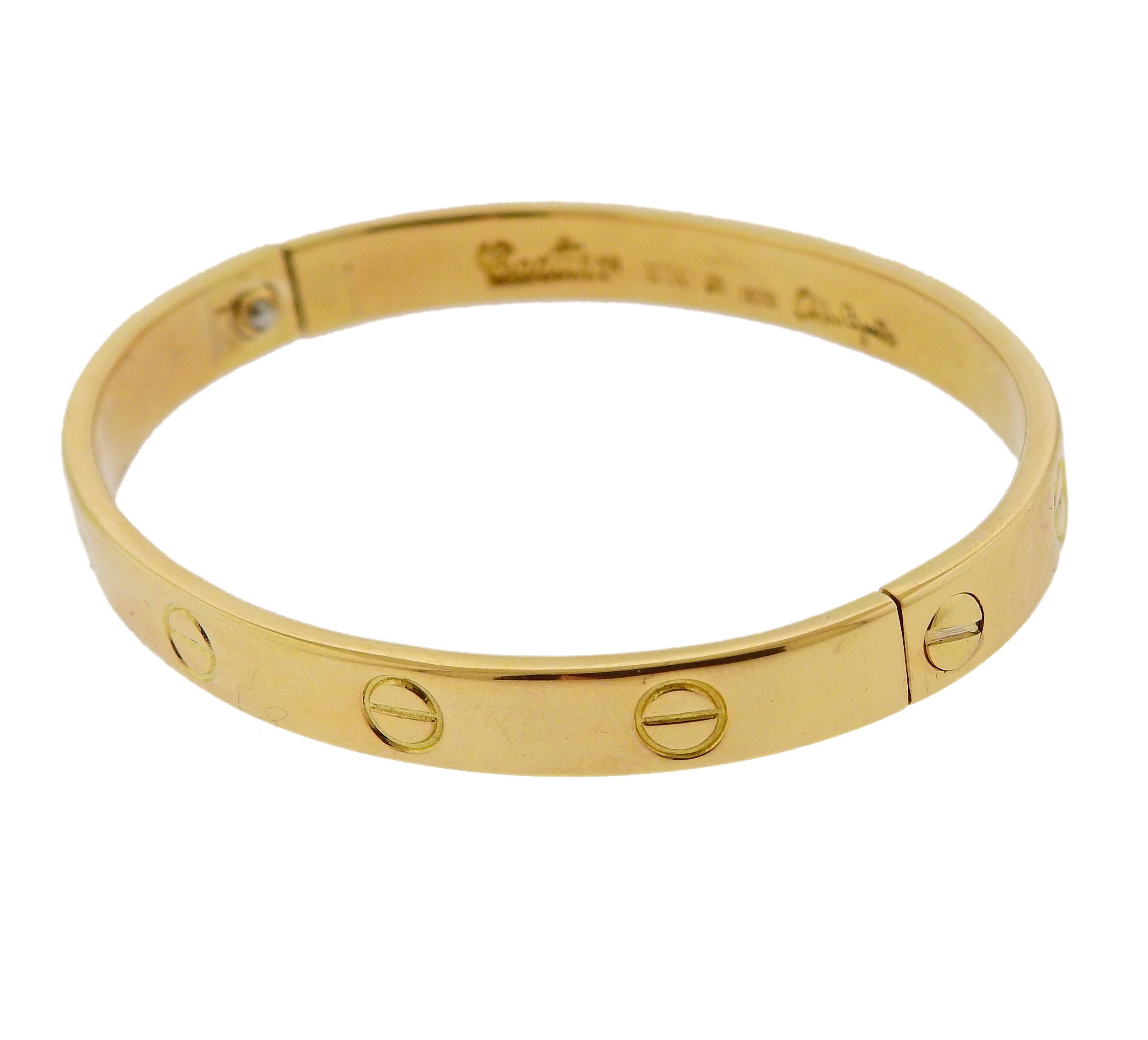 The original 1970 Cartier Love bracelet, designed and crafted by Aldo Cipullo in 18k yellow gold. The bracelet will fit up to a 6.5
