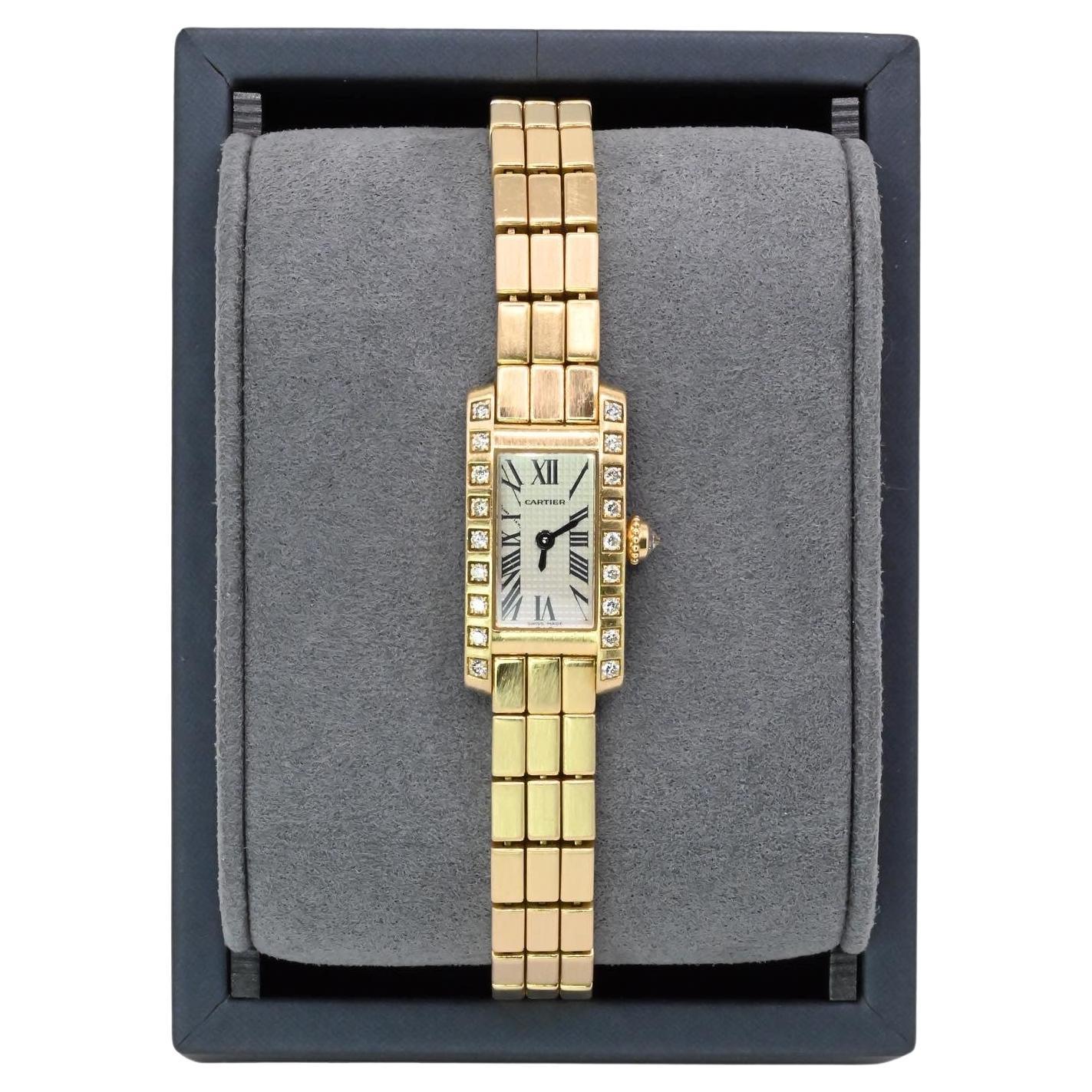 Cartier Tank Lanieres Watch with 18K Yellow Gold 

Has a lovely case with triple row 18K gold bracelet.  
Rectangular case, swiss quartz movement, sapphire crystal glass. Silver dial, Roman numeral hour markers, an 18k yellow Gold 14.5mm case,