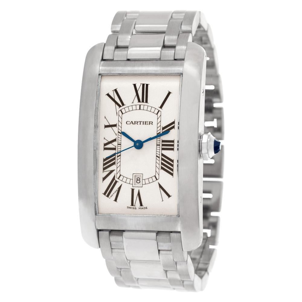Cartier Tank Americaine XL in 18k white gold with white dial , date display above the 6 and black Roman numeral hour markers. Auto w/ sweep seconds and date. 26 mm width x 45 mm length case size. Comes with original Box and booklets. Ref W26055L1.