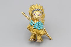 CARTIER American Indian Hunter Turquoise Diamond Ruby Sapphire 18k Gold Brooch