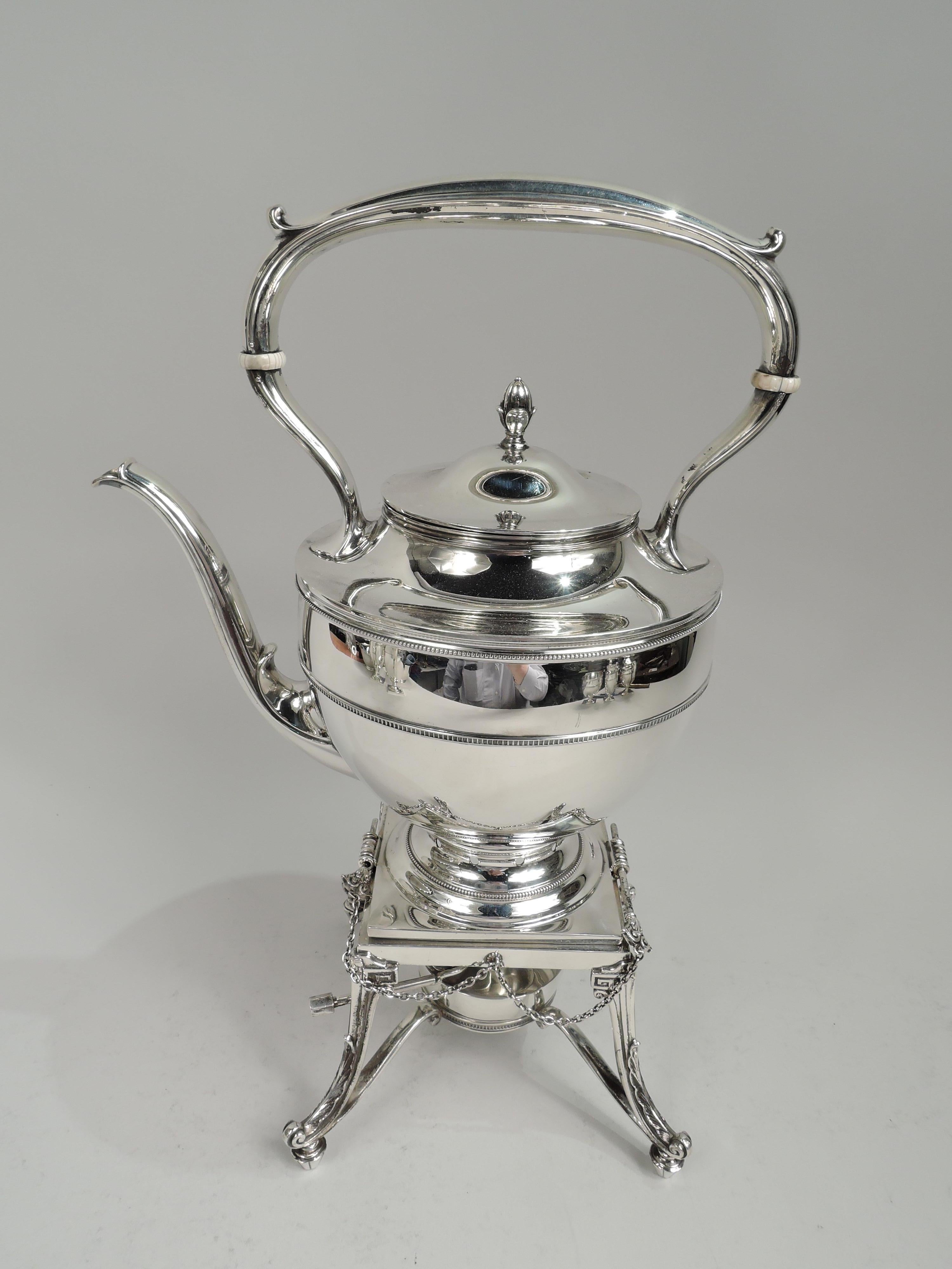 Modern Classical sterling silver 7-piece coffee and tea set, 1920-1. Retailed by Cartier in New York. This set comprises hot water kettle on stand, coffeepot, teapot, creamer, sugar, waste bowl, and tray.

Each: Oval or round body on round foot